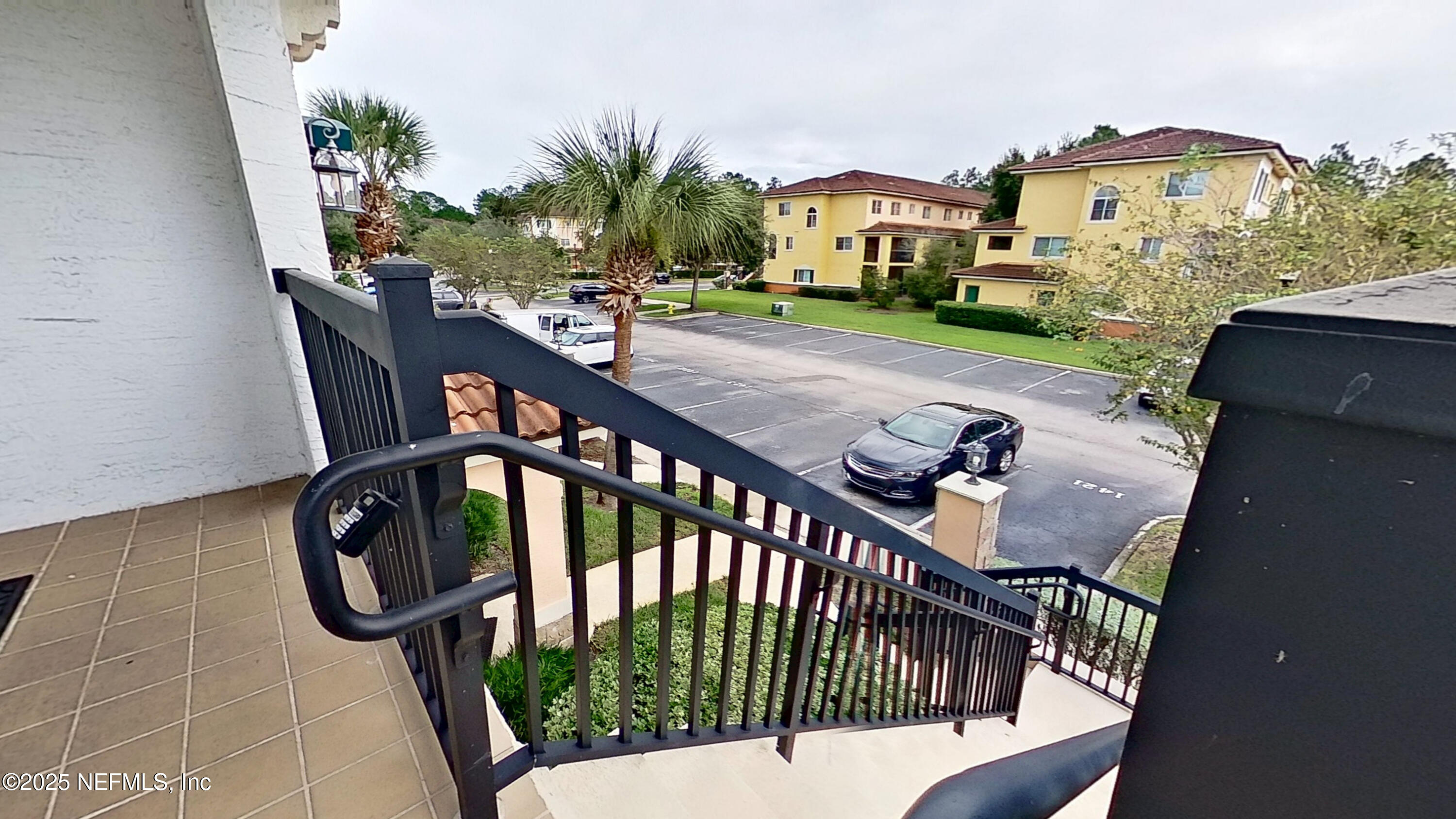 9745 Touchton Road, Unit 1421 Jacksonville, FL 32246 - Photo 3 of 22 a view of balcony with furniture and garden
