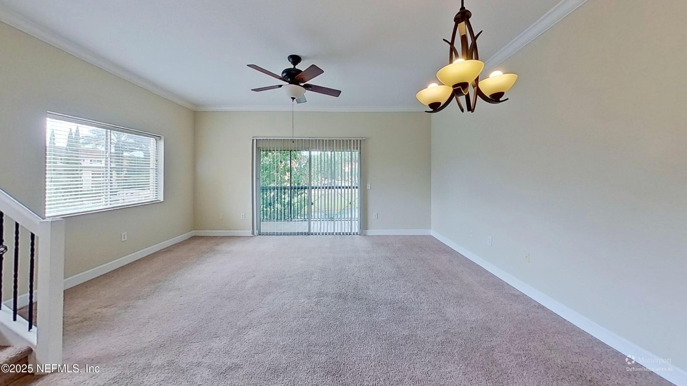 9745 Touchton Road, Unit 1421 Jacksonville, FL 32246 - Photo 5 of 22 a view of an empty room with window