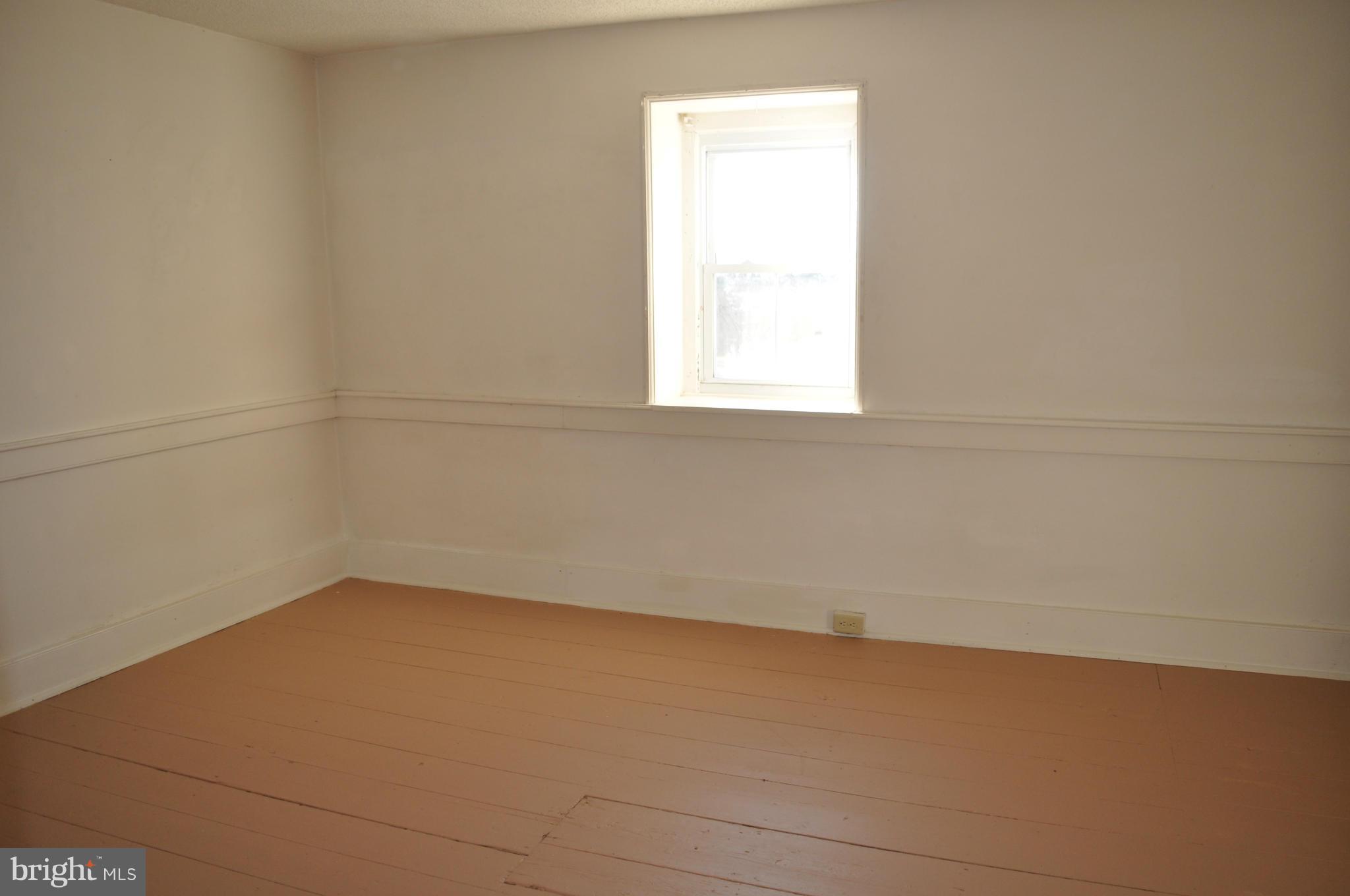 7234 Tommytown Road Sharpsburg, MD 21782 - Photo 26 of 40 a view of a small space with wooden floor and a window