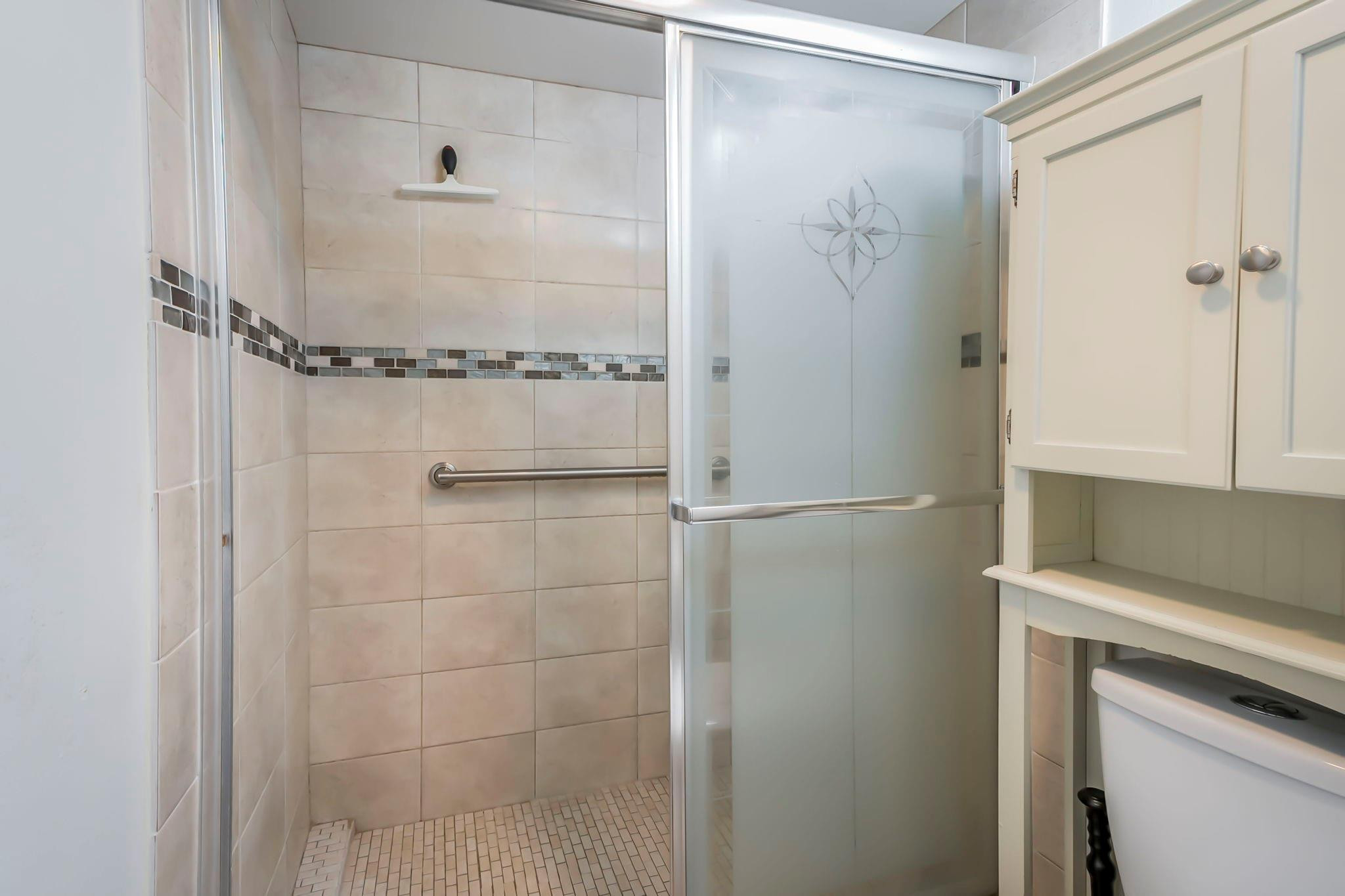 9401 Lime Bay Boulevard, Unit 209 Tamarac, FL 33321 - Photo 13 of 24 a bathroom with a shower