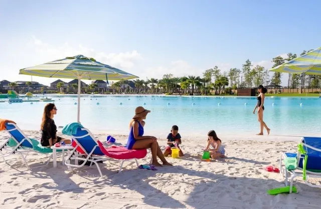 a group of people standing on top of a park