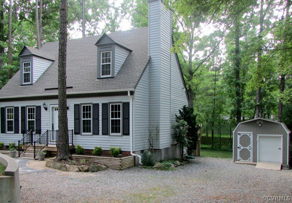 2900 Shiloh Church Road Midlothian, VA 23112 - Photo 3 of 15 a front view of a house with garden