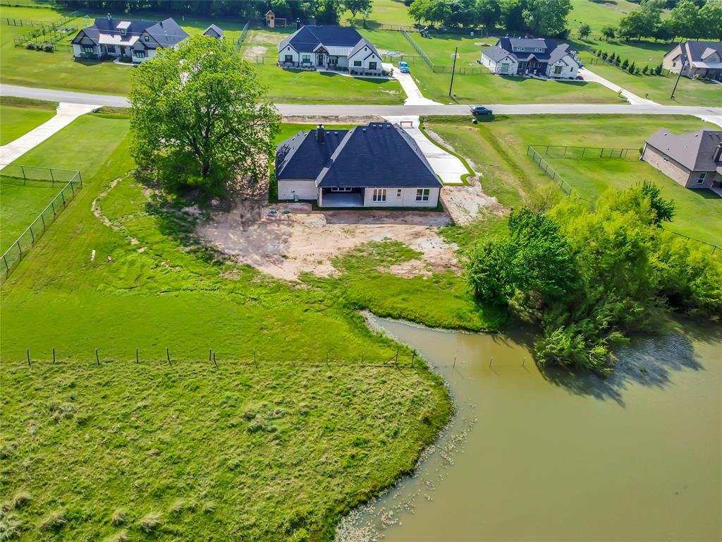 1028 Henry Way Springtown, TX 76082 - Photo 39 of 40 a view of swimming pool with a garden