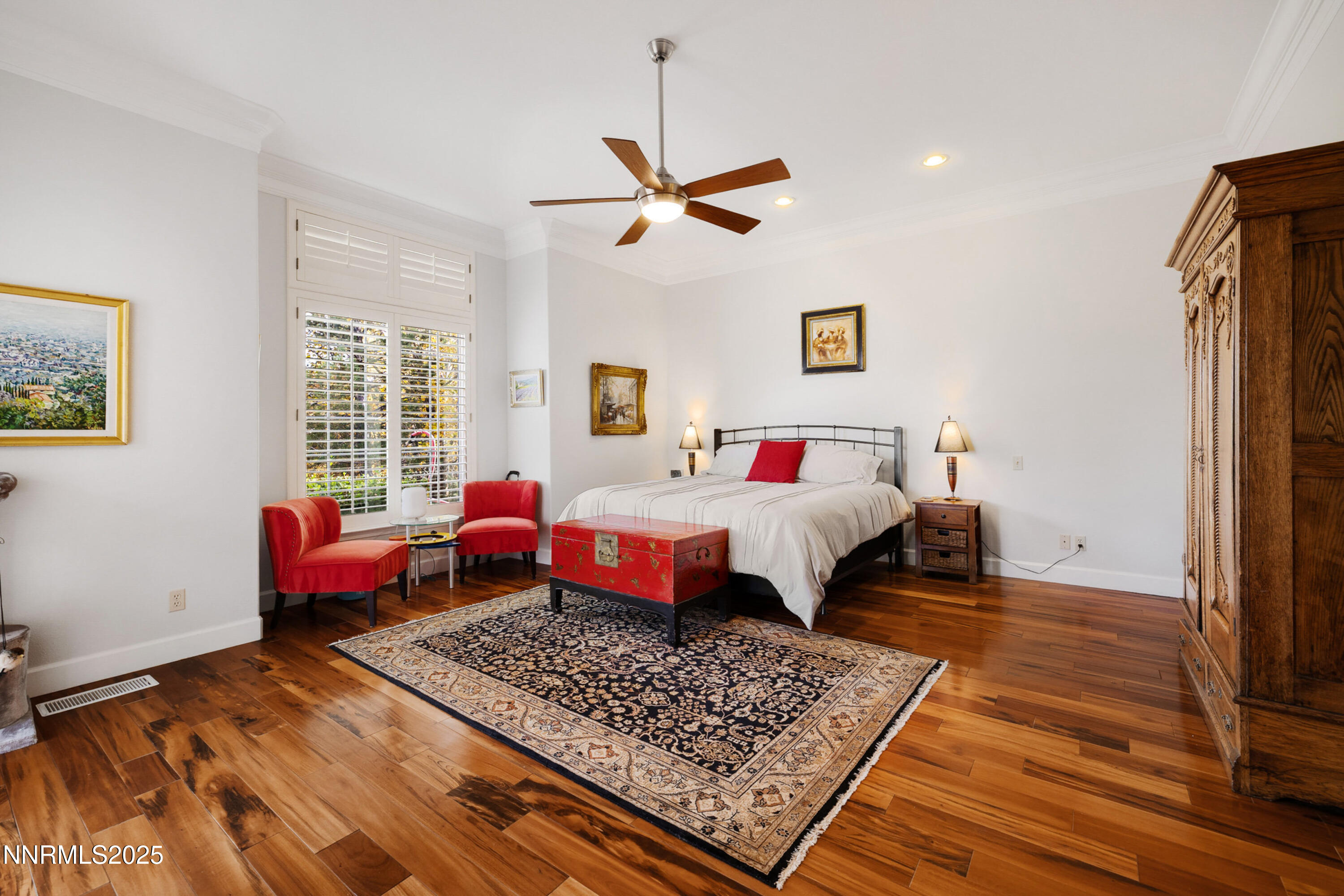 14240 Bandolier Court Reno, NV 89511 - Photo 19 of 47 a bed room with a bed window and a couch