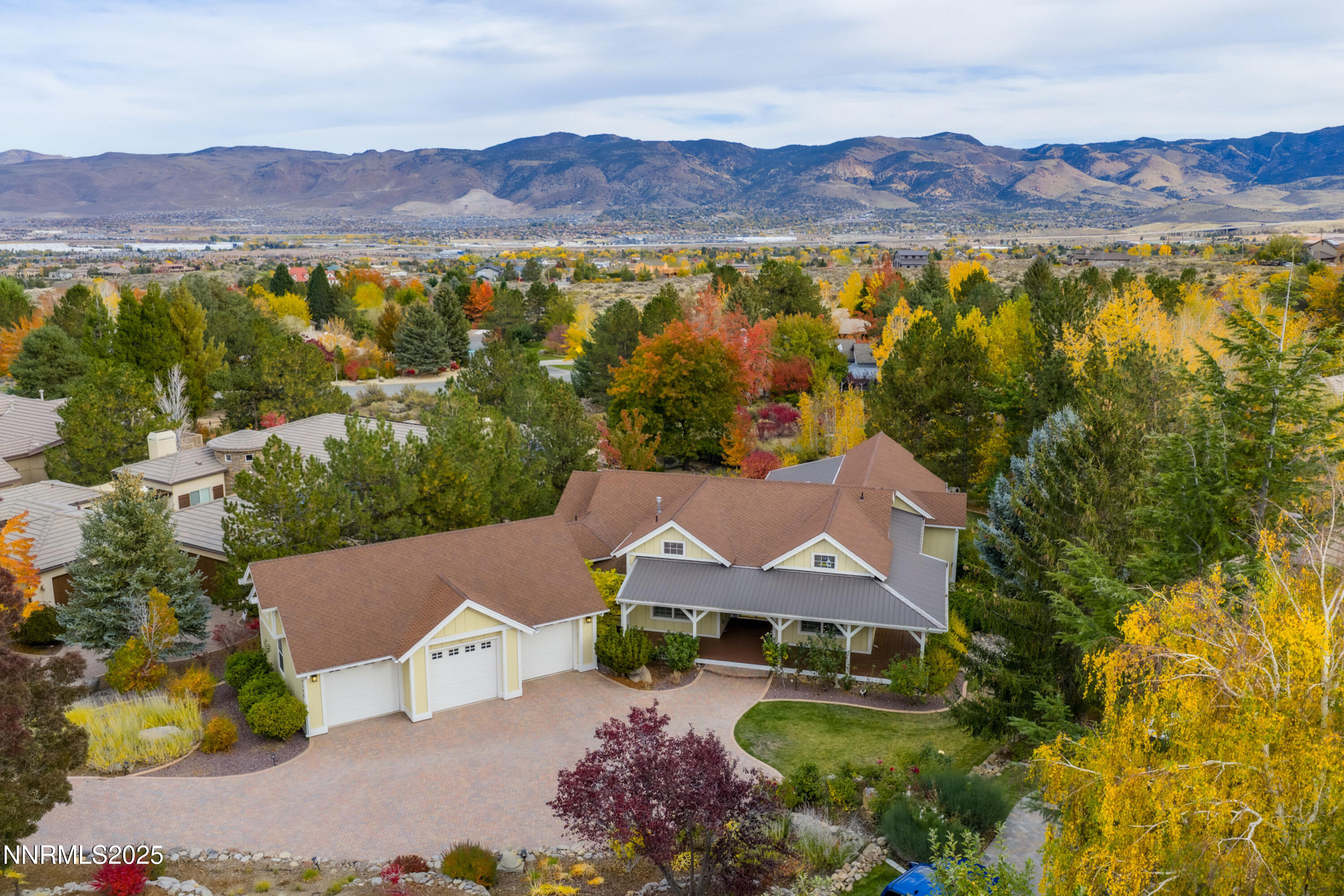 14240 Bandolier Court Reno, NV 89511 - Photo 2 of 47 an aerial view of a house with mountain view