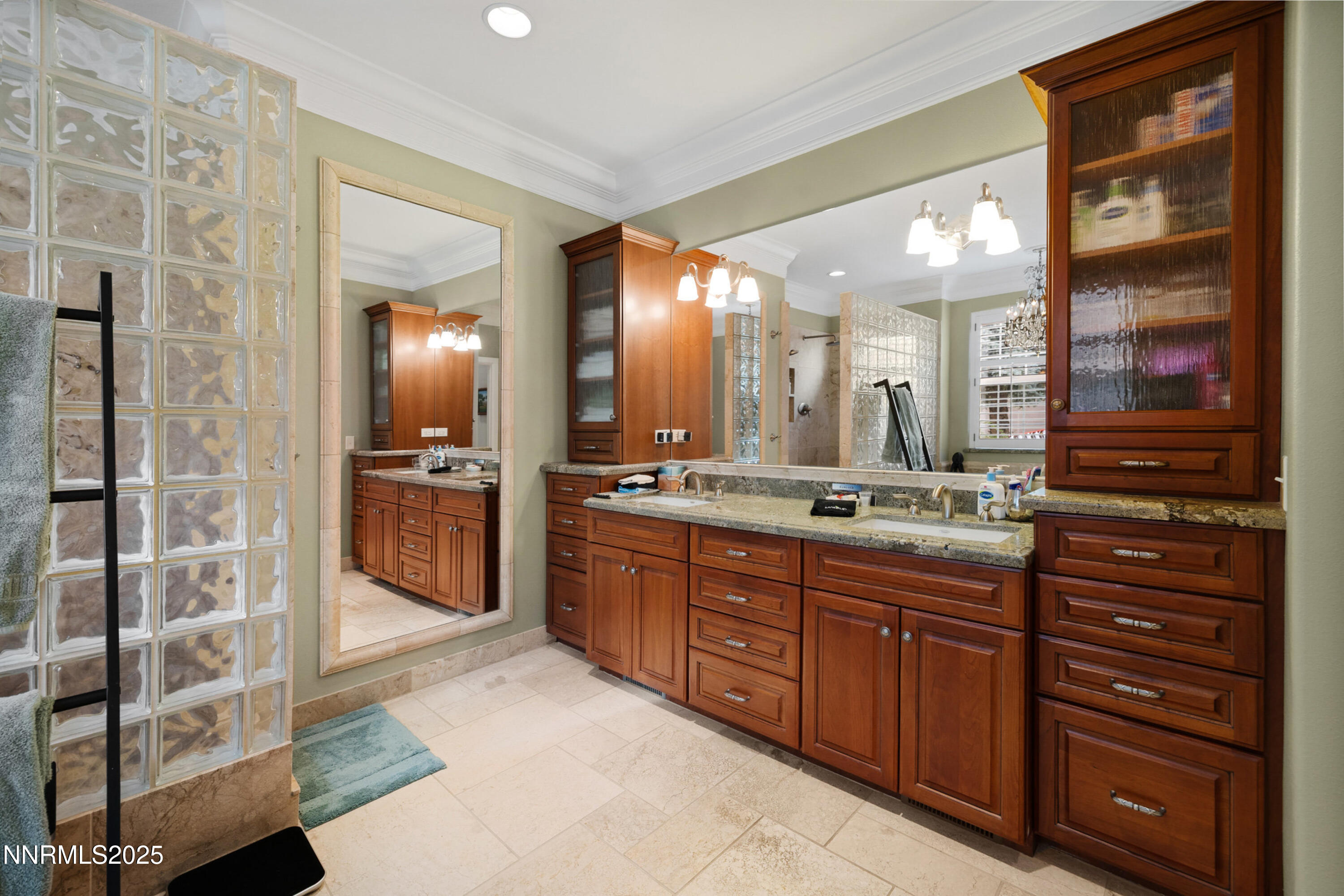 14240 Bandolier Court Reno, NV 89511 - Photo 23 of 47 a bathroom with a granite countertop sink mirror and shower