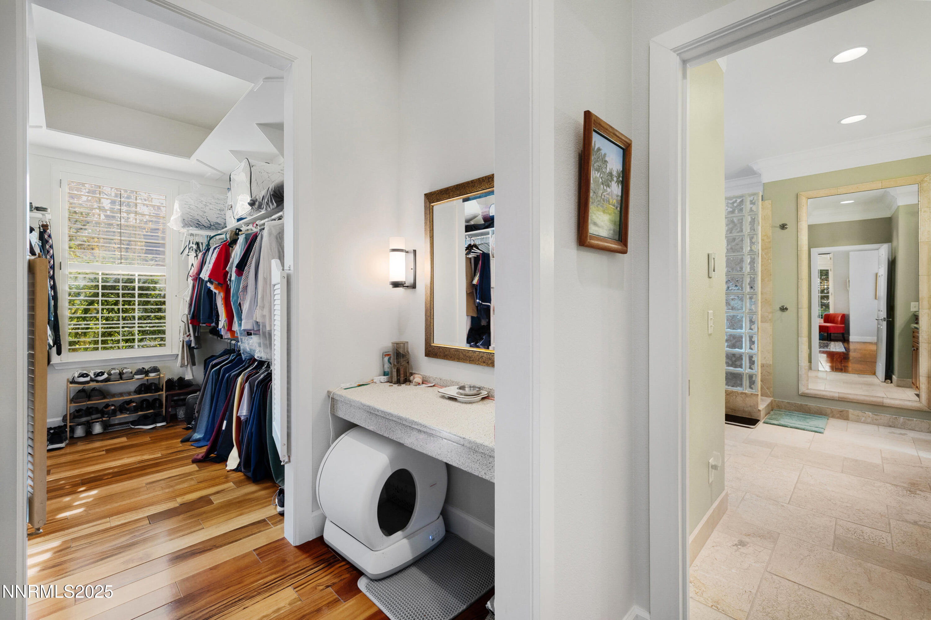 14240 Bandolier Court Reno, NV 89511 - Photo 23 of 47 a view of walk in closet with clothes and shoes