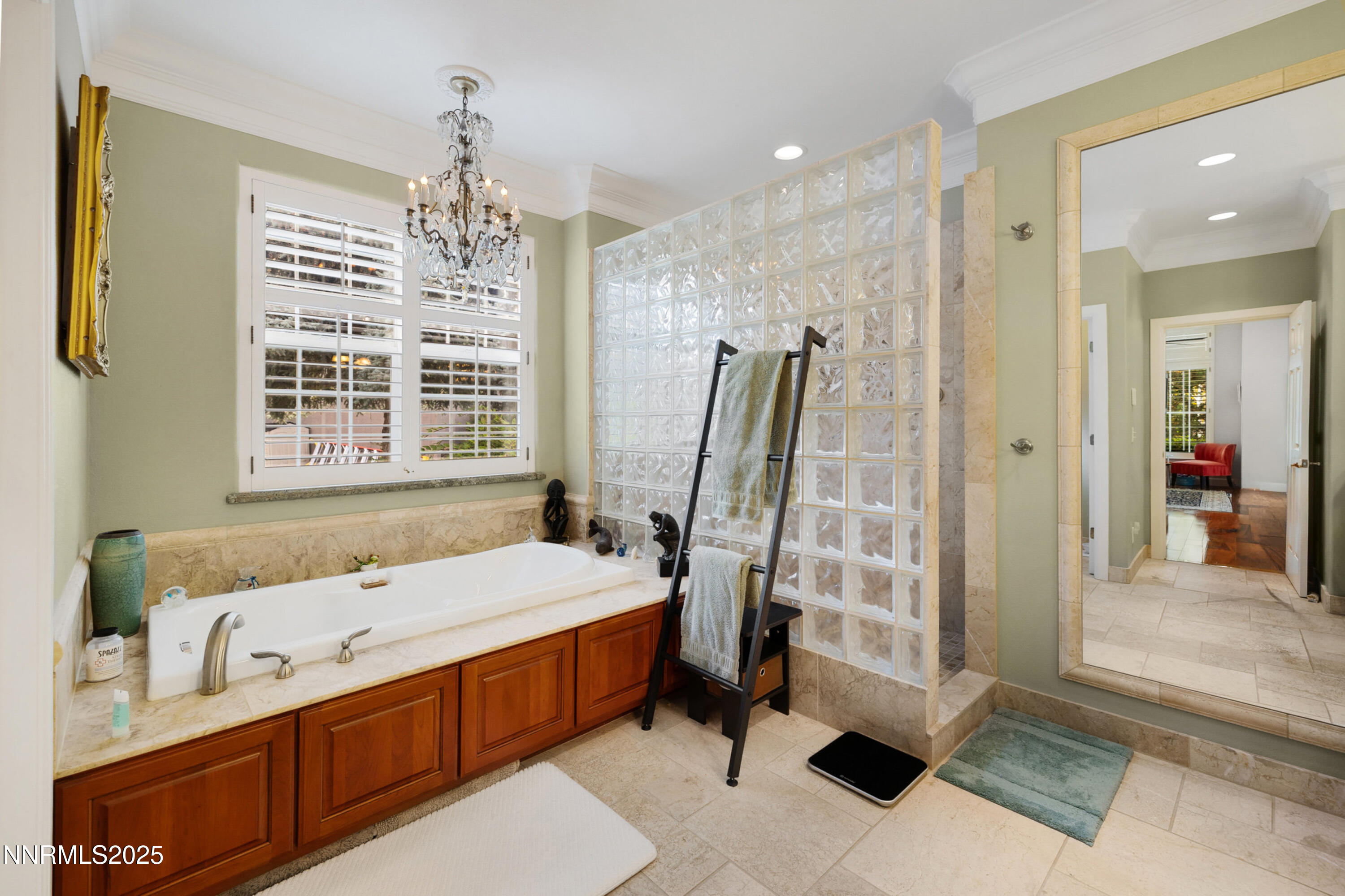 14240 Bandolier Court Reno, NV 89511 - Photo 25 of 47 a bathroom with a tub sink and a shower