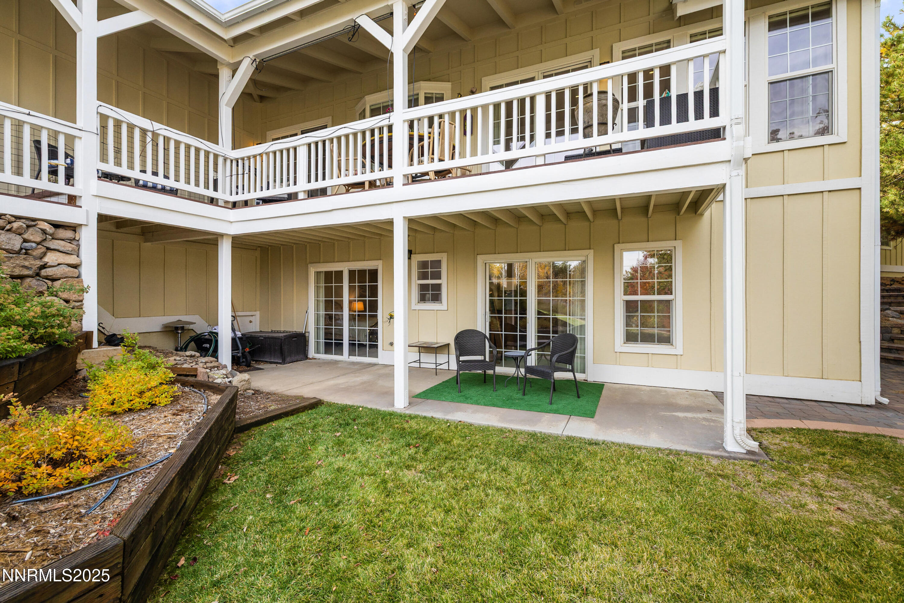 14240 Bandolier Court Reno, NV 89511 - Photo 32 of 47 front view of a house with a yard