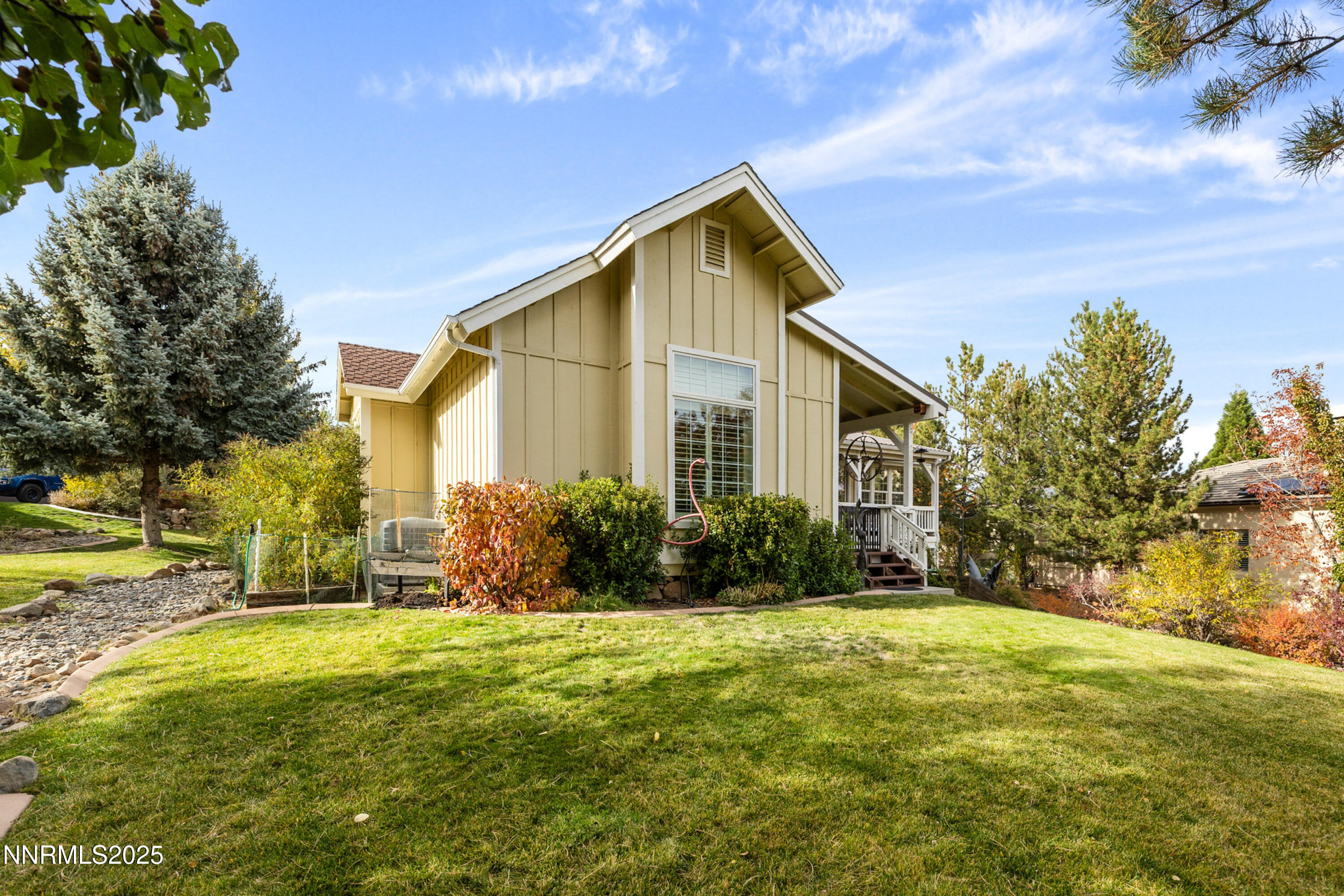 14240 Bandolier Court Reno, NV 89511 - Photo 38 of 47 a view of a house with a yard