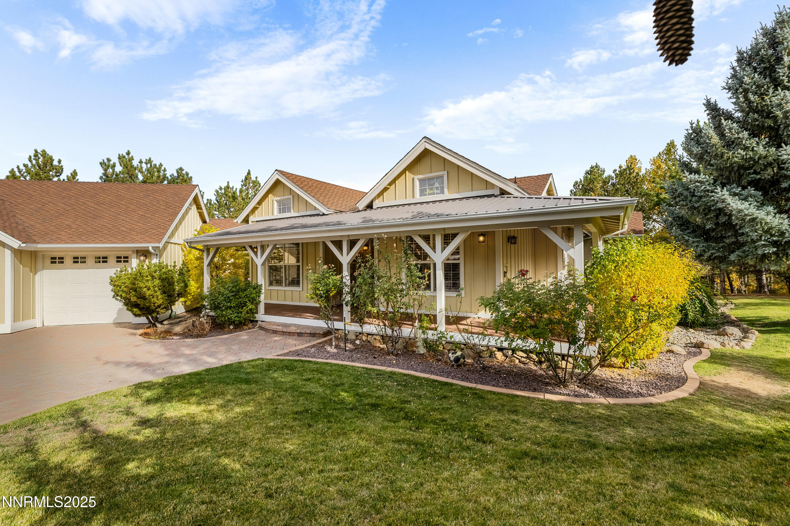 14240 Bandolier Court Reno, NV 89511 - Photo 39 of 47 a front view of a house with swimming pool and porch