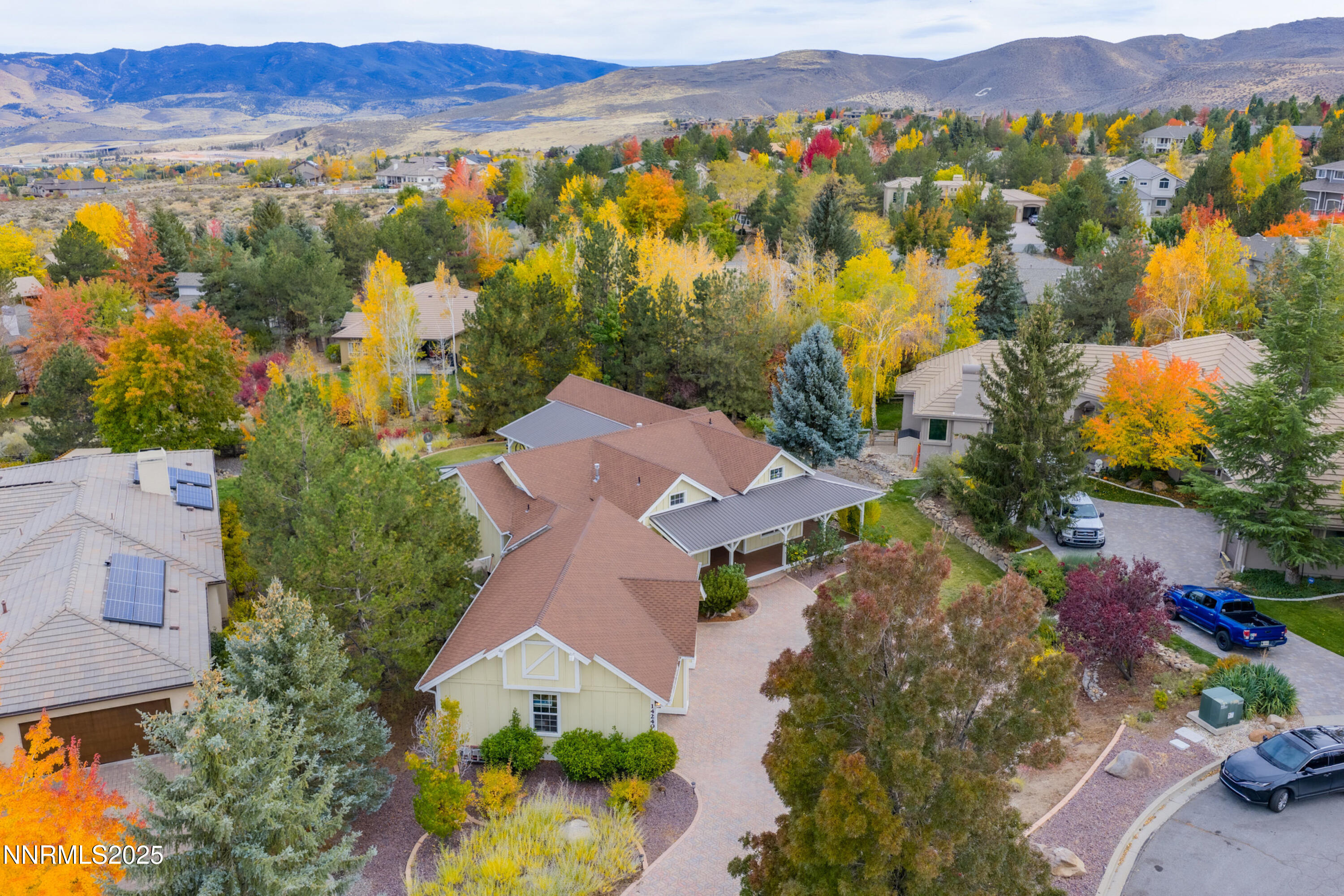 14240 Bandolier Court Reno, NV 89511 - Photo 43 of 47 an aerial view of residential house with an outdoor space and mountain view