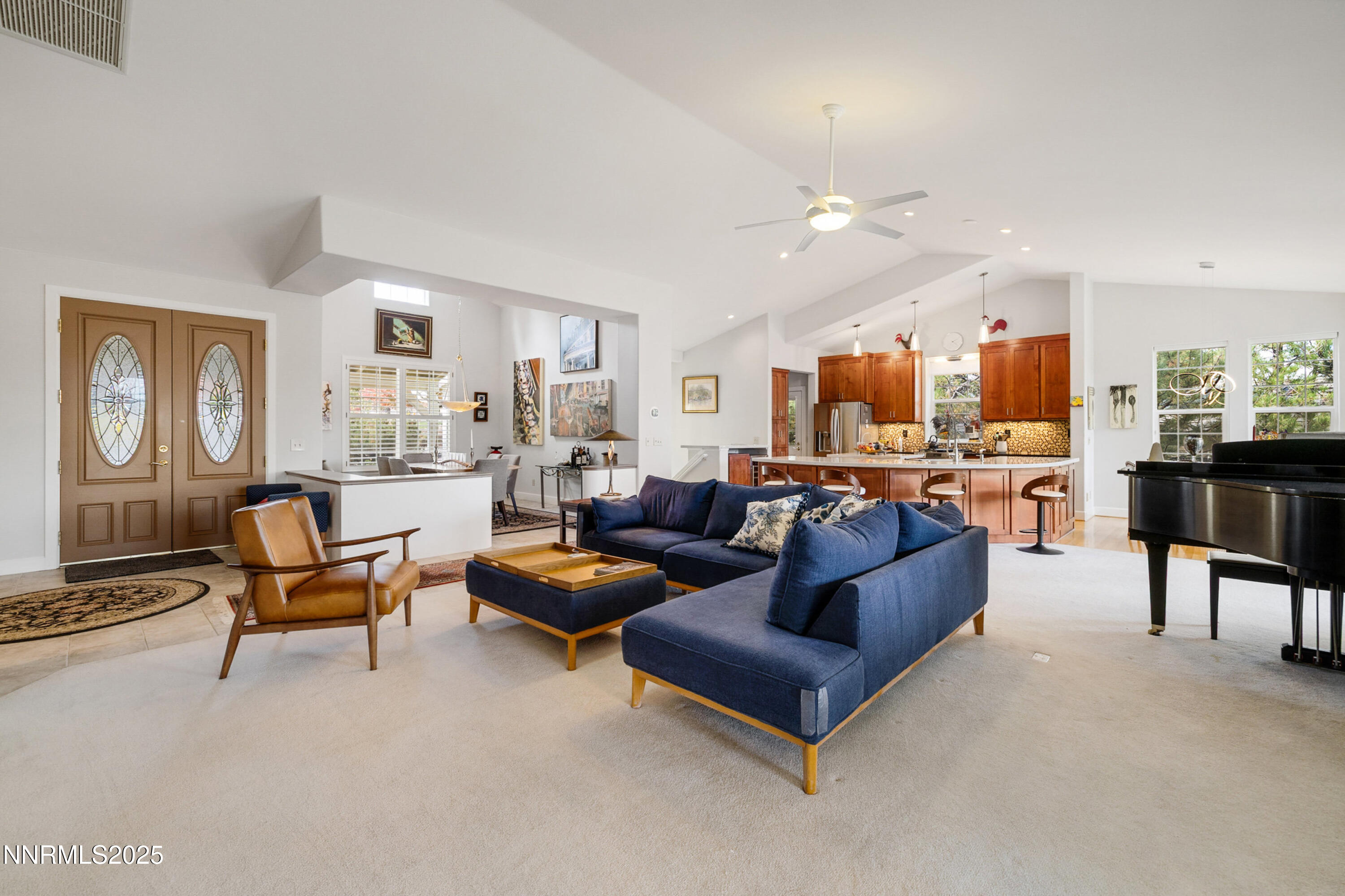 14240 Bandolier Court Reno, NV 89511 - Photo 6 of 47 a living room with furniture and a large window