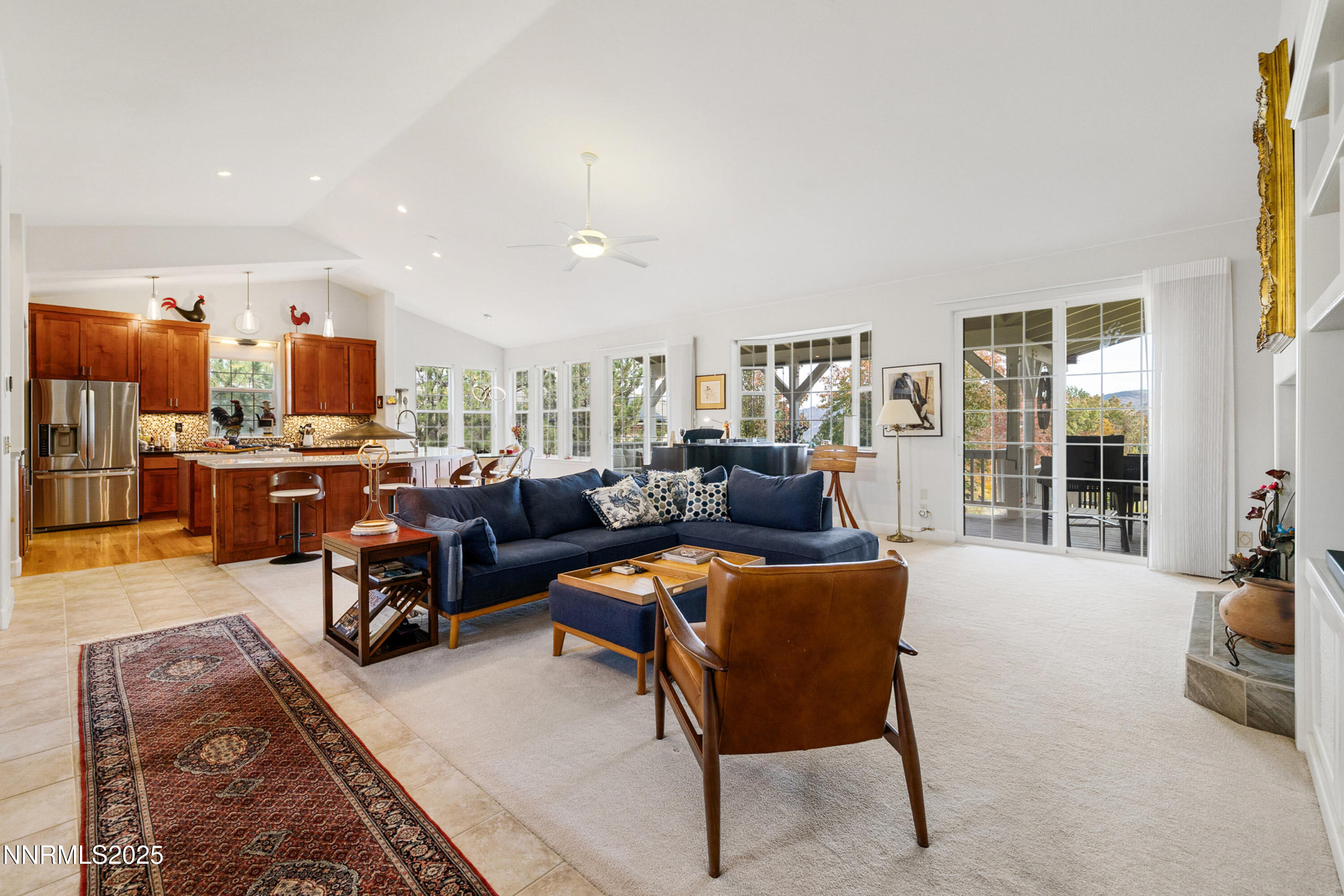 14240 Bandolier Court Reno, NV 89511 - Photo 7 of 47 a living room with furniture and a large window