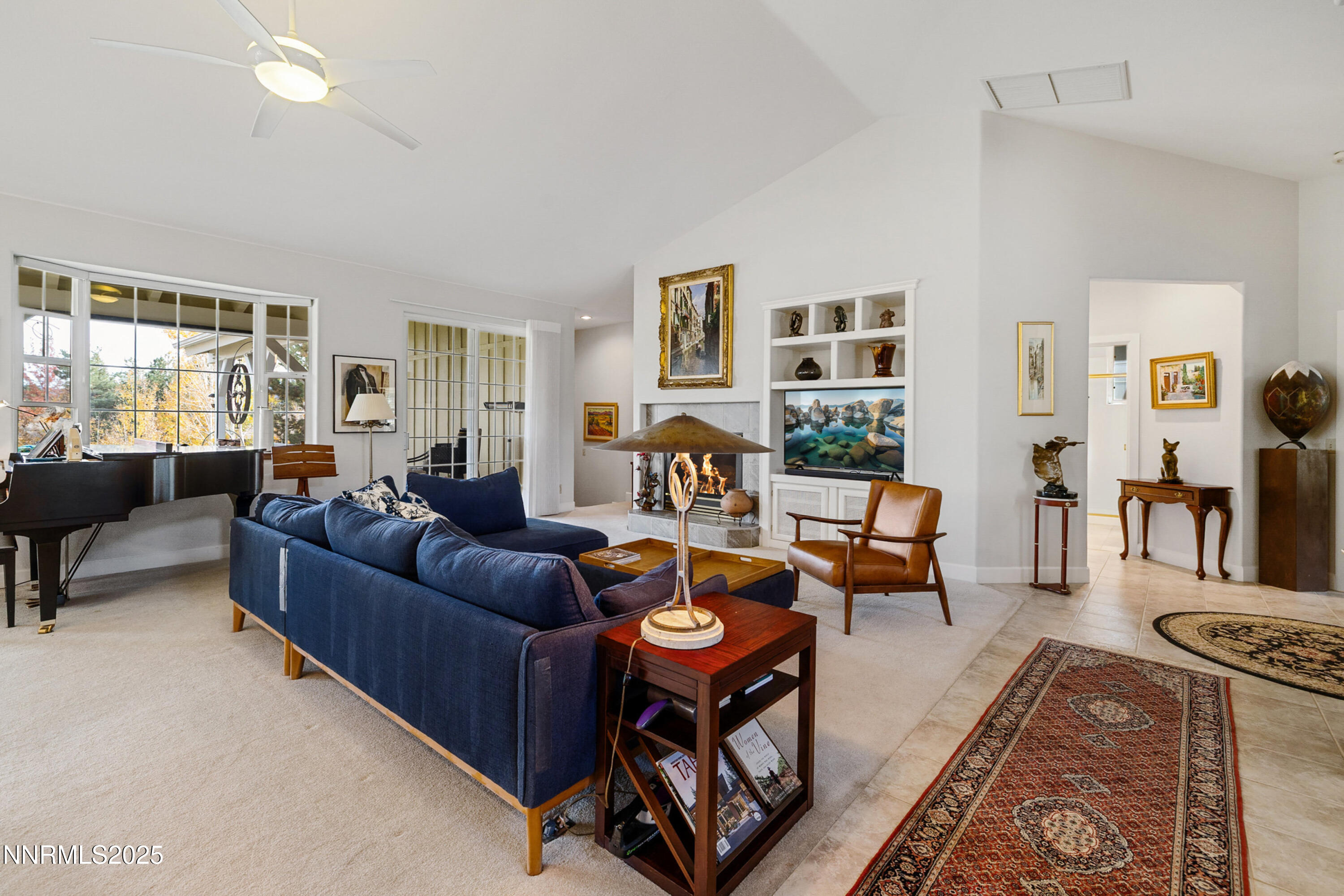 14240 Bandolier Court Reno, NV 89511 - Photo 7 of 47 a living room with furniture and a window