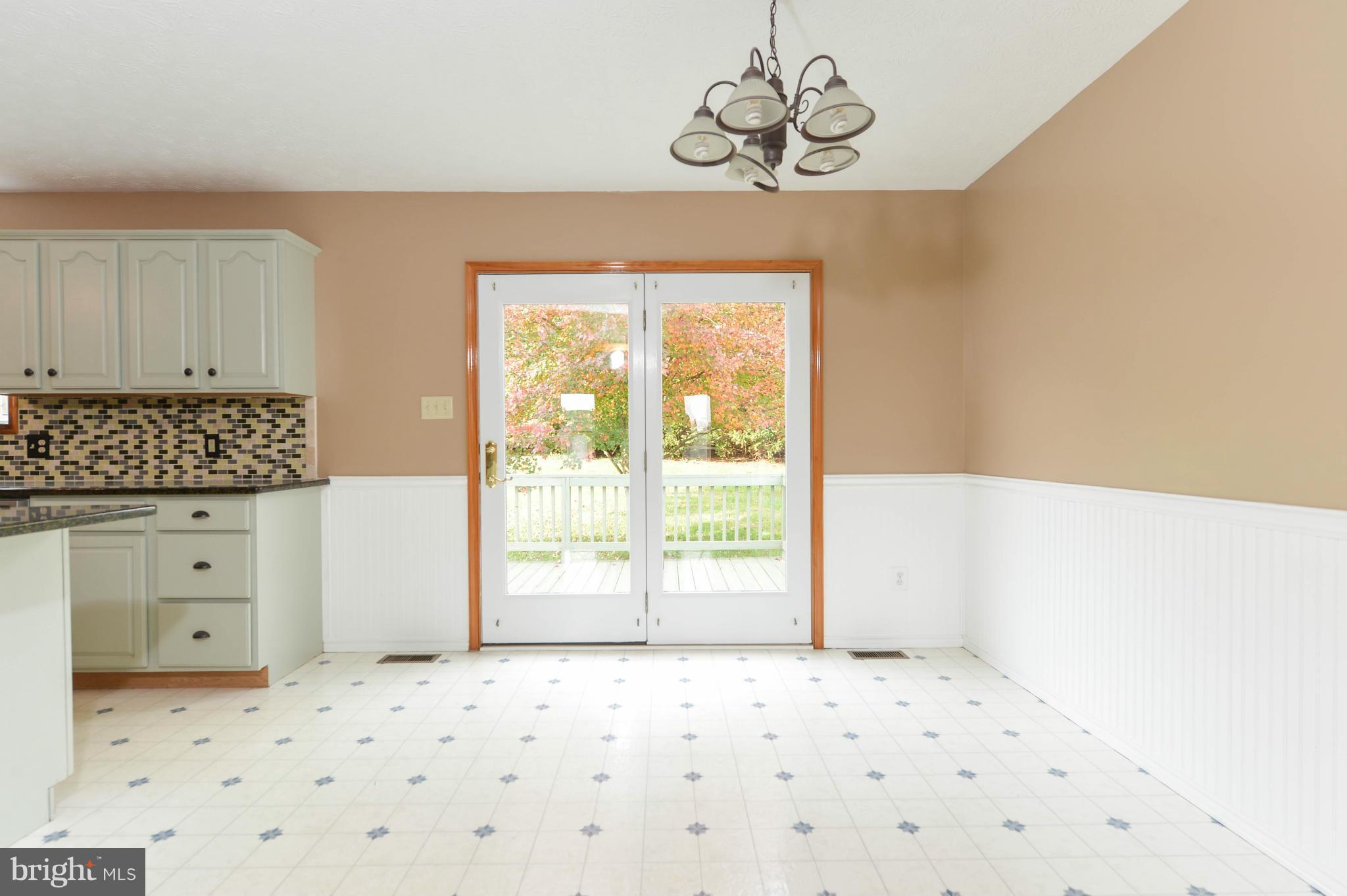 104 Little Brick Court Rising Sun, MD 21911 - Photo 5 of 22 ATRIUM DOOR LEADING TO DECK