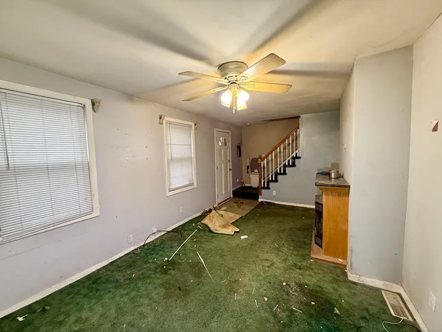 a view of an entryway with a hall