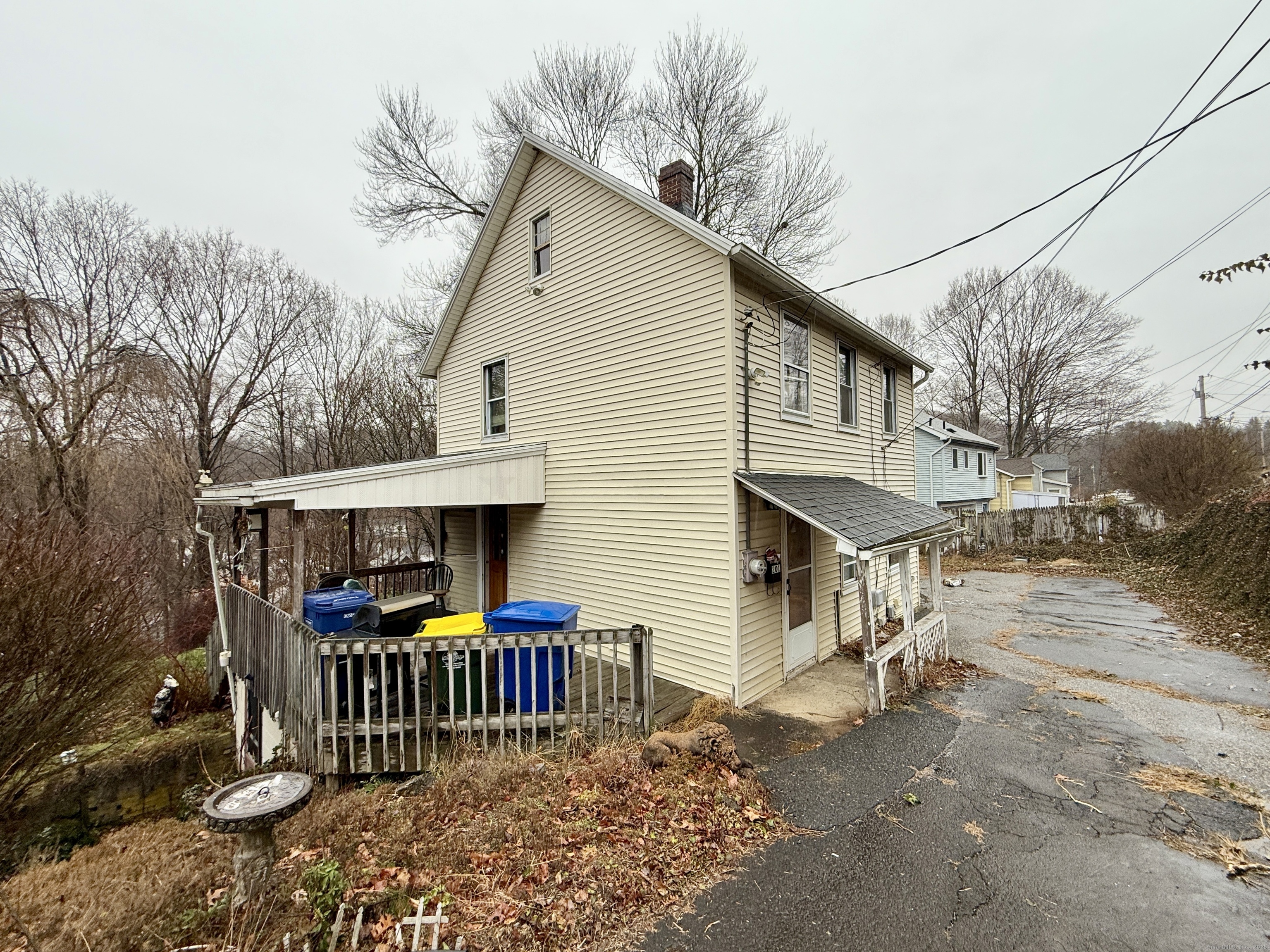 201 Prospect Street Ansonia, CT 06401 - Photo 3 of 28 a front view of house with street and trees