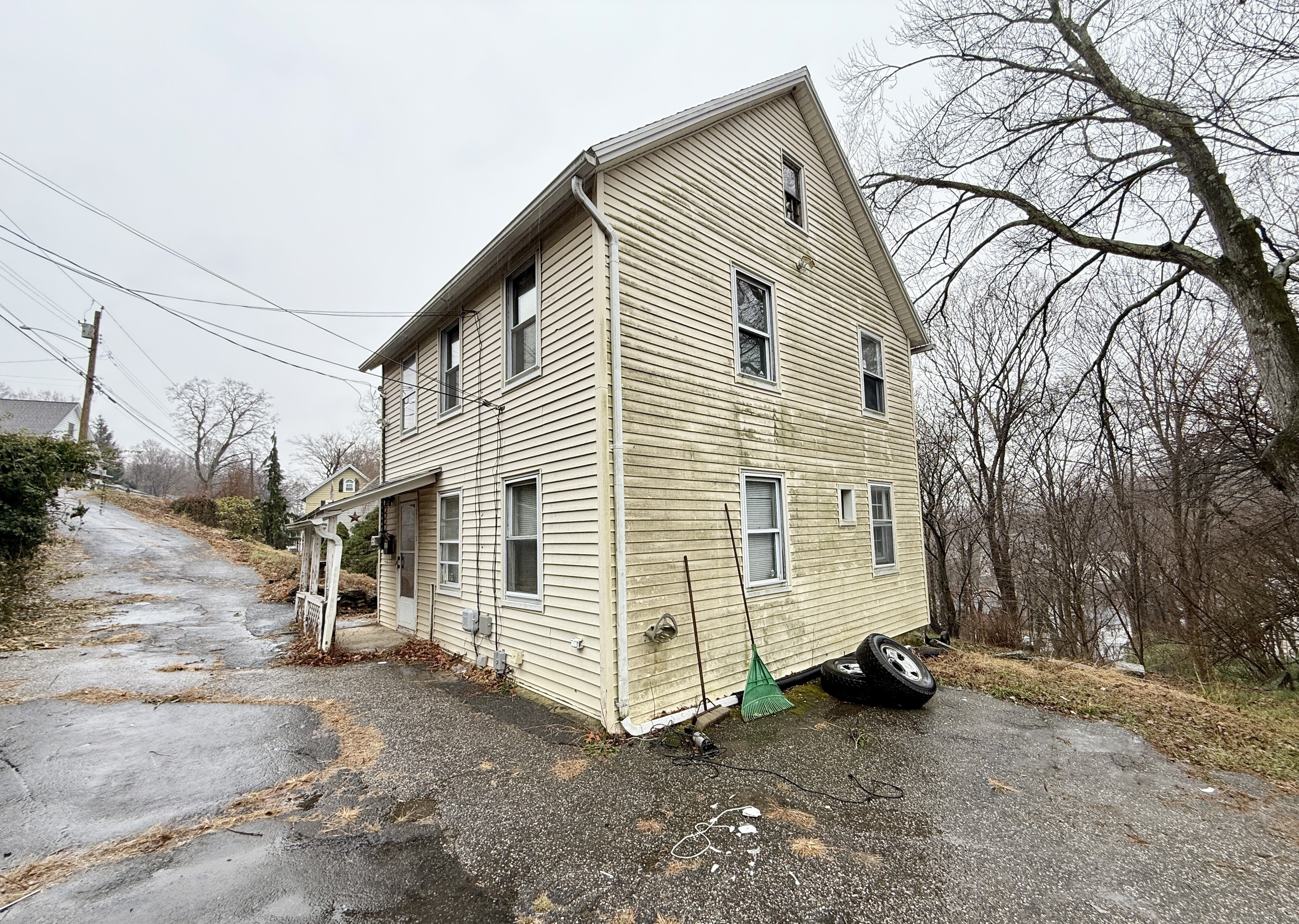 201 Prospect Street Ansonia, CT 06401 - Photo 4 of 28 a view of a house with a yard