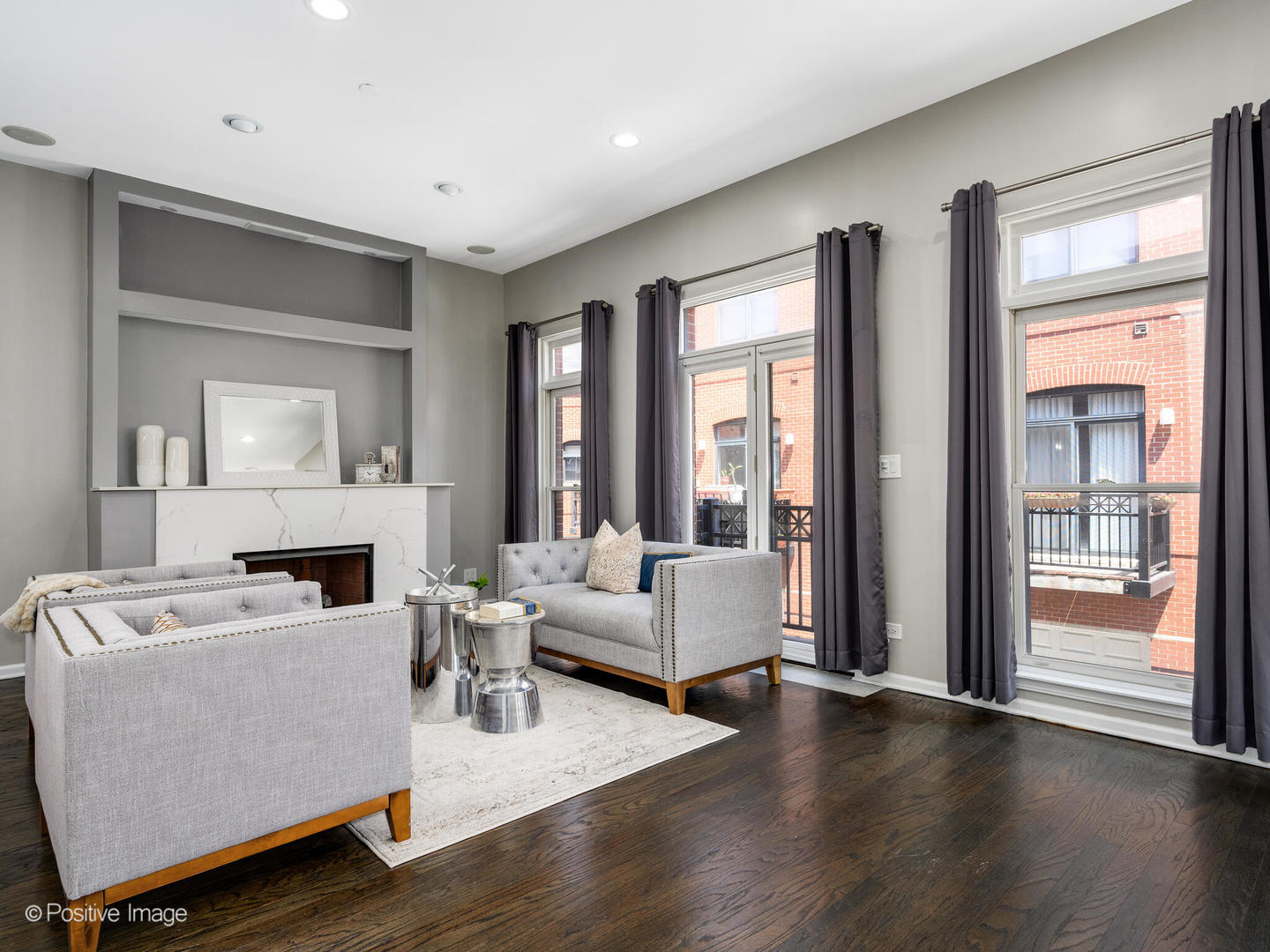 910 West Village Court Chicago, IL 60608 - Photo 11 of 44 a living room with fireplace furniture and a large window