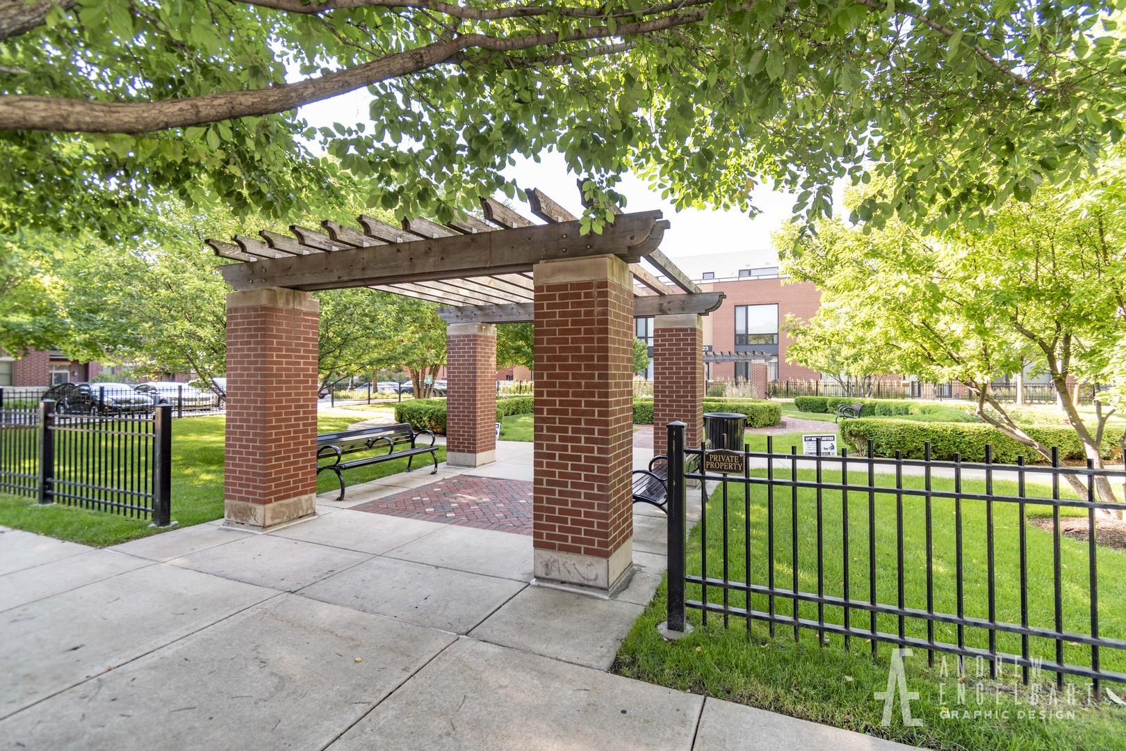 910 West Village Court Chicago, IL 60608 - Photo 33 of 44 a view of a house with a small yard and plants
