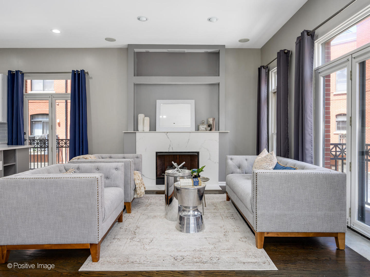 910 West Village Court Chicago, IL 60608 - Photo 10 of 44 a living room with furniture and a fireplace