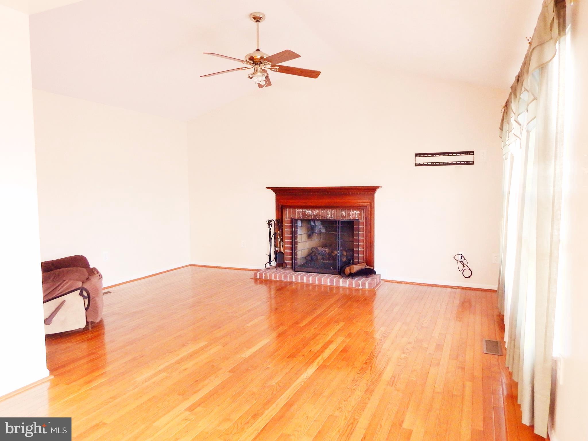 3322 Pouska Road Abingdon, MD 21009 - Photo 11 of 39 Vaulted Ceilings in Family Room w/ Fireplace!