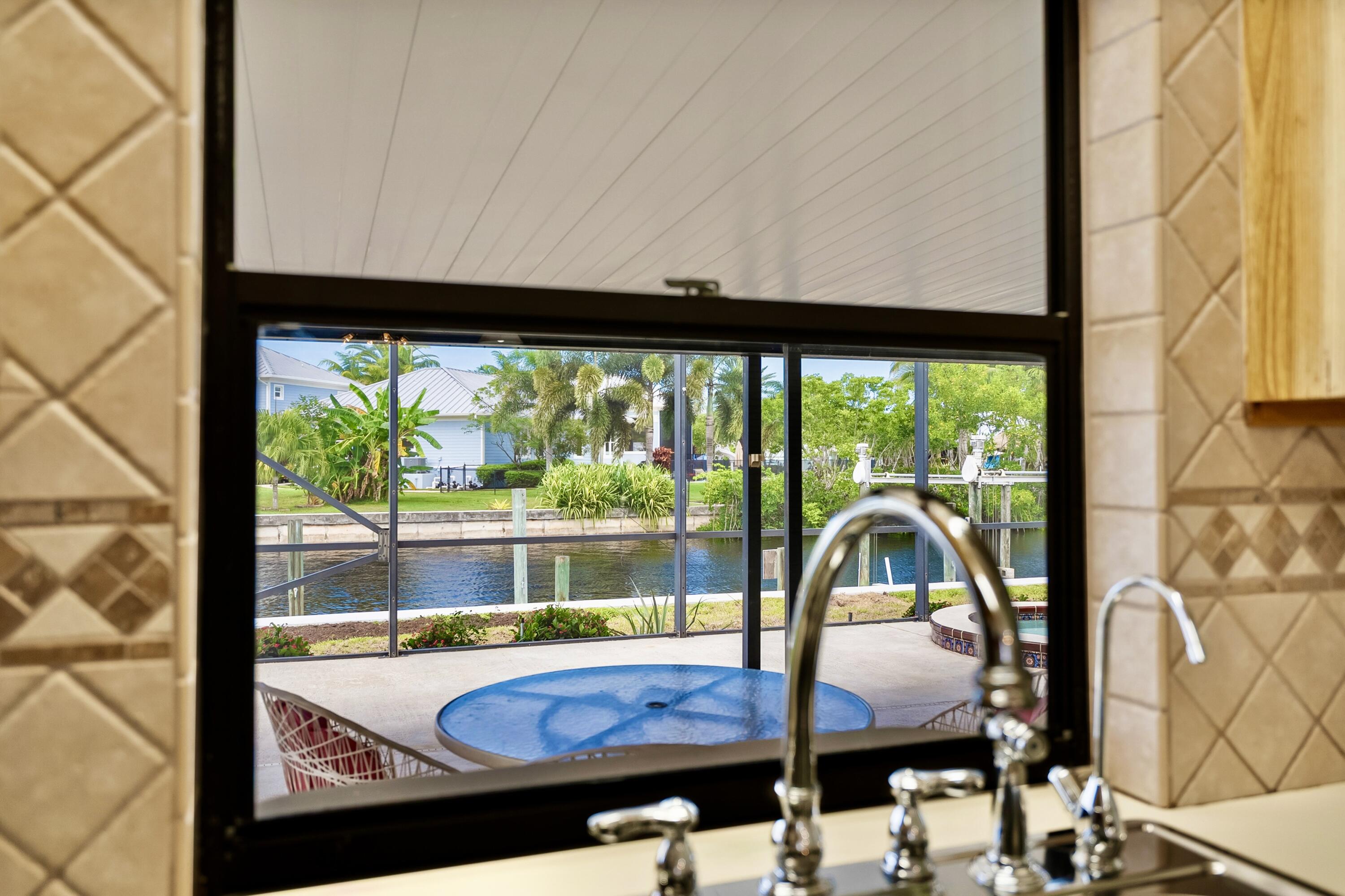 1545 Southwest Dyer Point Road Palm City, FL 34990 - Photo 26 of 44 View from the kitchen window.