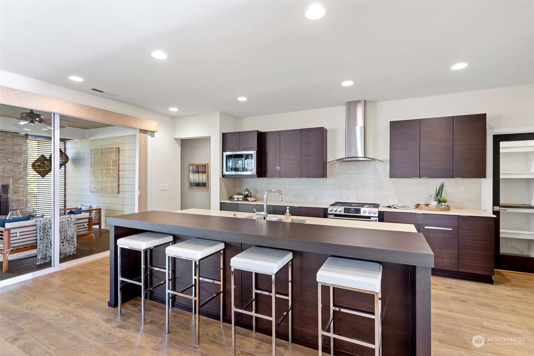 3917 171st Street Southeast Bothell, WA 98012 - Photo 13 of 33 a large kitchen with cabinets table and chairs