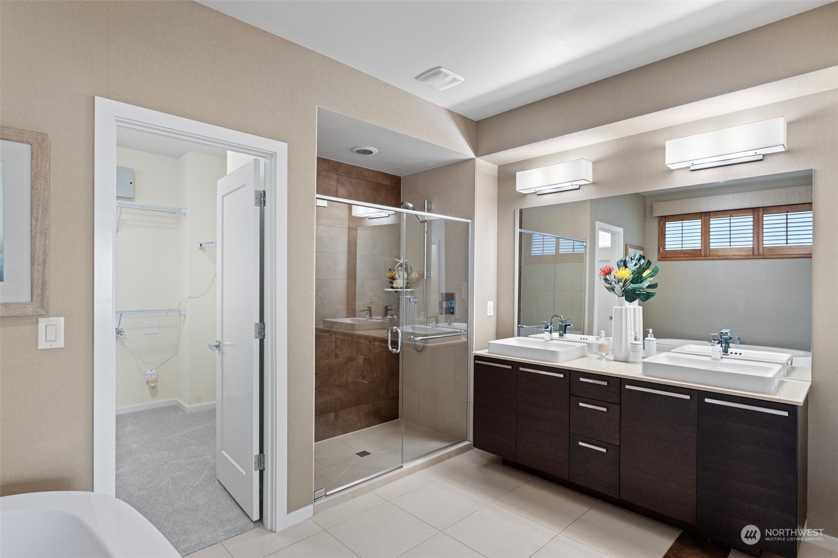 3917 171st Street Southeast Bothell, WA 98012 - Photo 18 of 33 a bathroom with a double vanity sink mirror and shower