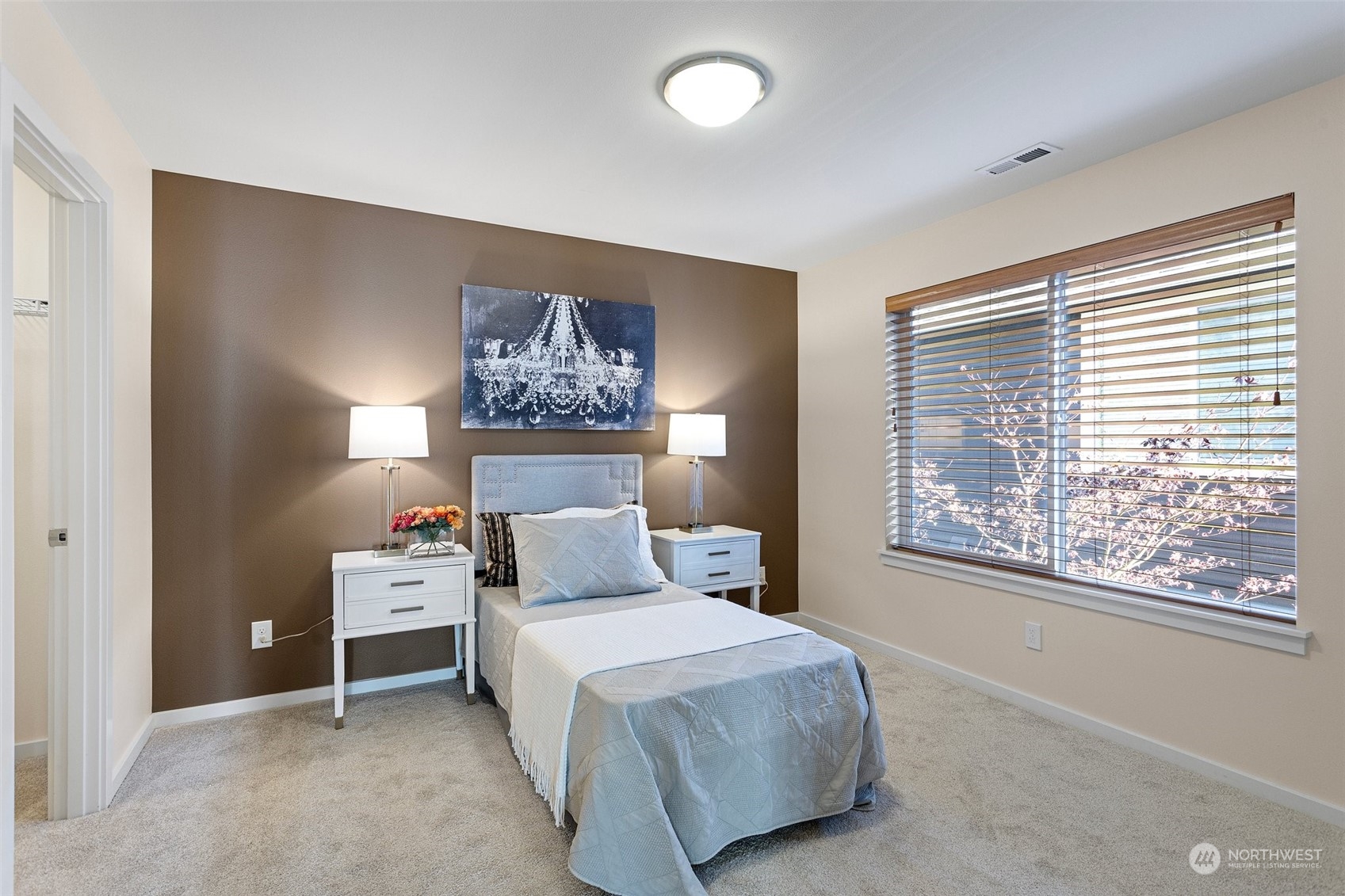 3917 171st Street Southeast Bothell, WA 98012 - Photo 23 of 33 a bedroom with a bed and a large window