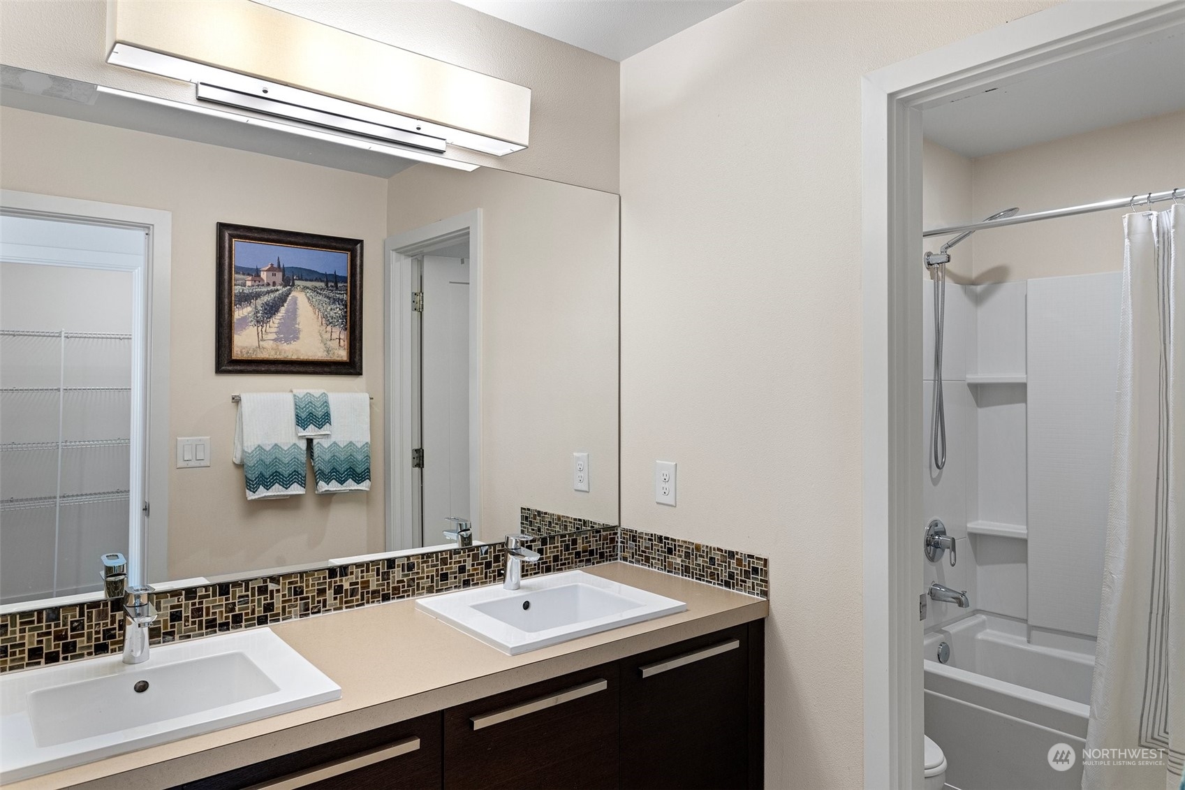3917 171st Street Southeast Bothell, WA 98012 - Photo 24 of 33 a bathroom with a sink and a mirror with toilet