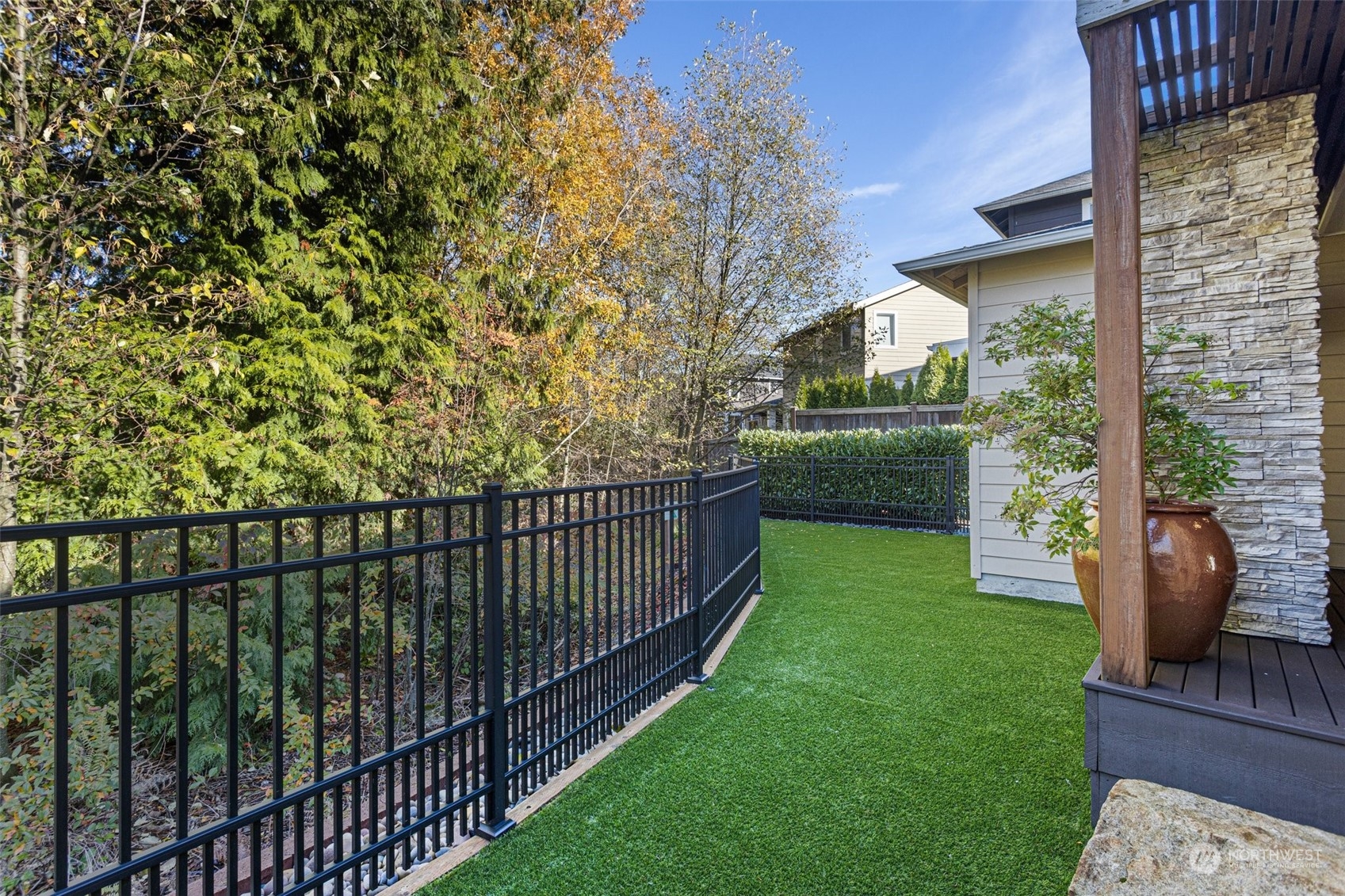 3917 171st Street Southeast Bothell, WA 98012 - Photo 28 of 33 a view of a porch with furniture and garden