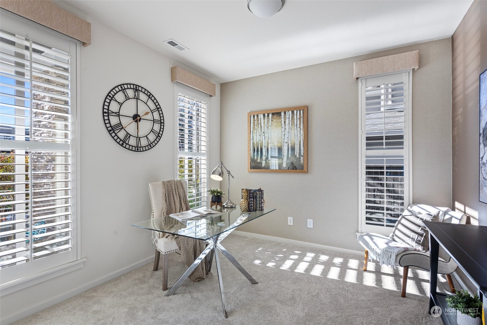 3917 171st Street Southeast Bothell, WA 98012 - Photo 4 of 33 a workspace with furniture and a window