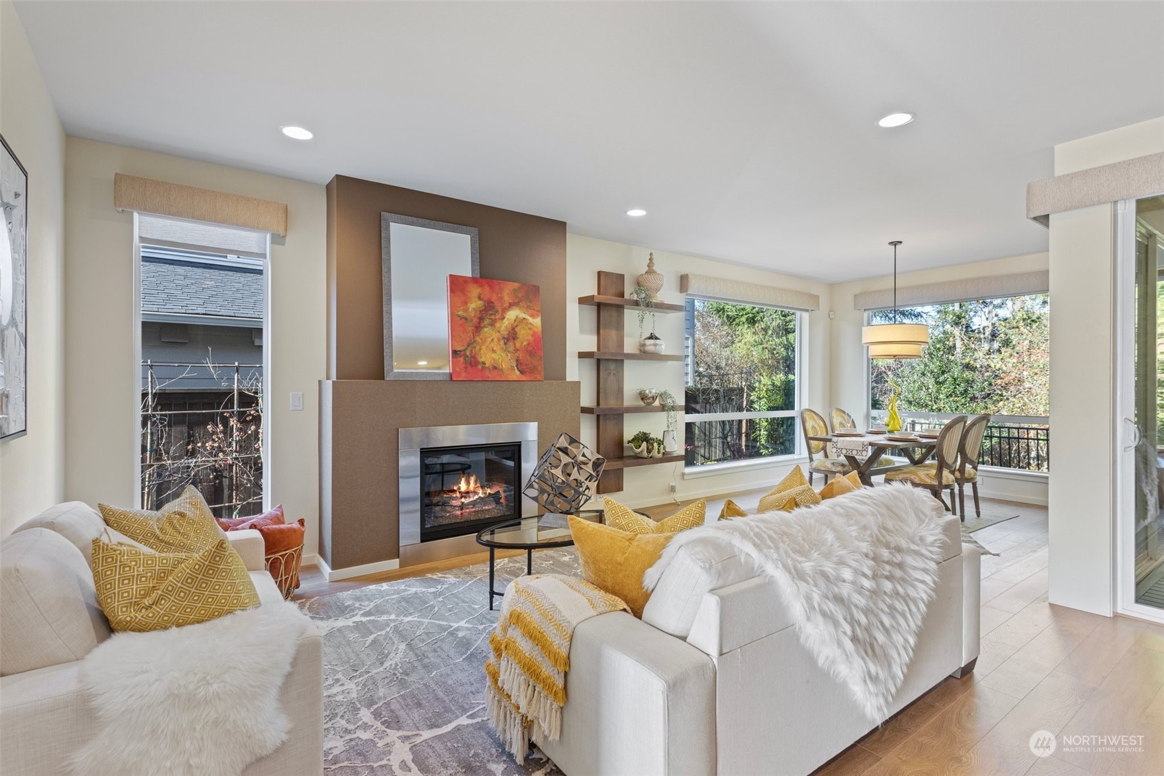 3917 171st Street Southeast Bothell, WA 98012 - Photo 7 of 33 a living room with furniture fireplace and a large window
