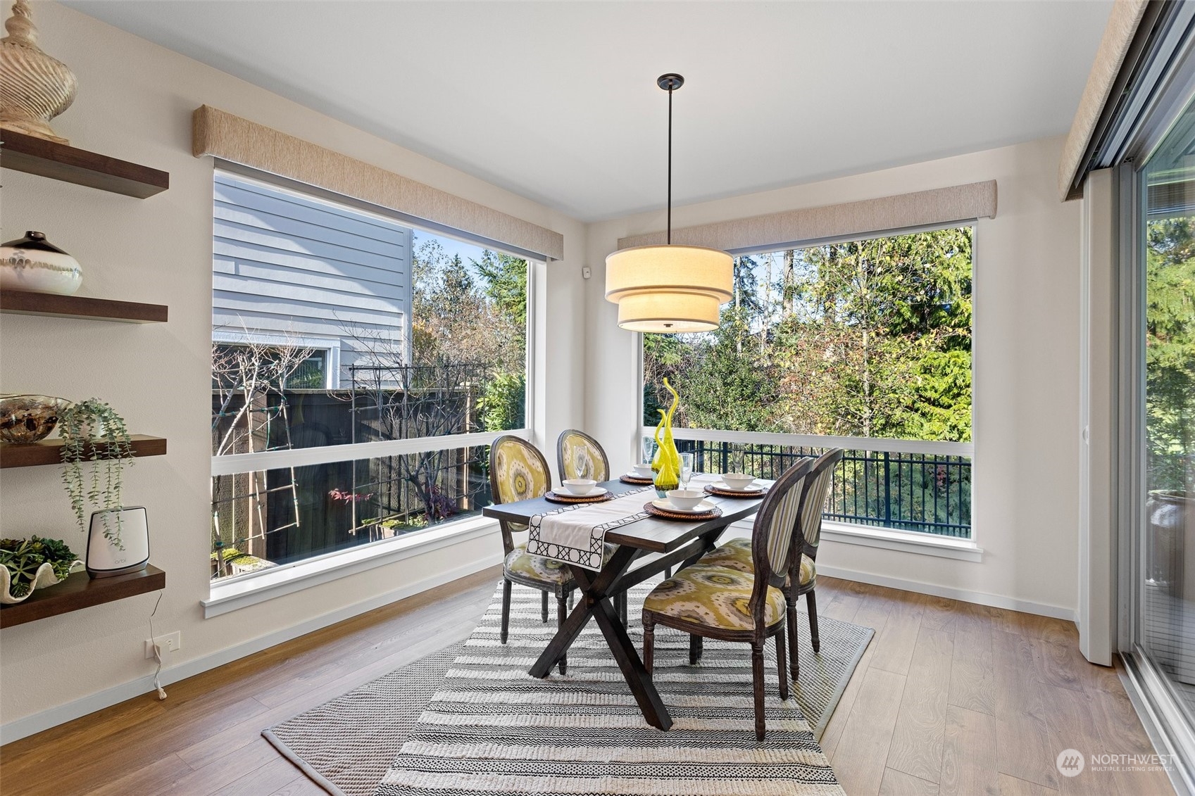 3917 171st Street Southeast Bothell, WA 98012 - Photo 10 of 33 a view of a dining room with furniture window and outside view