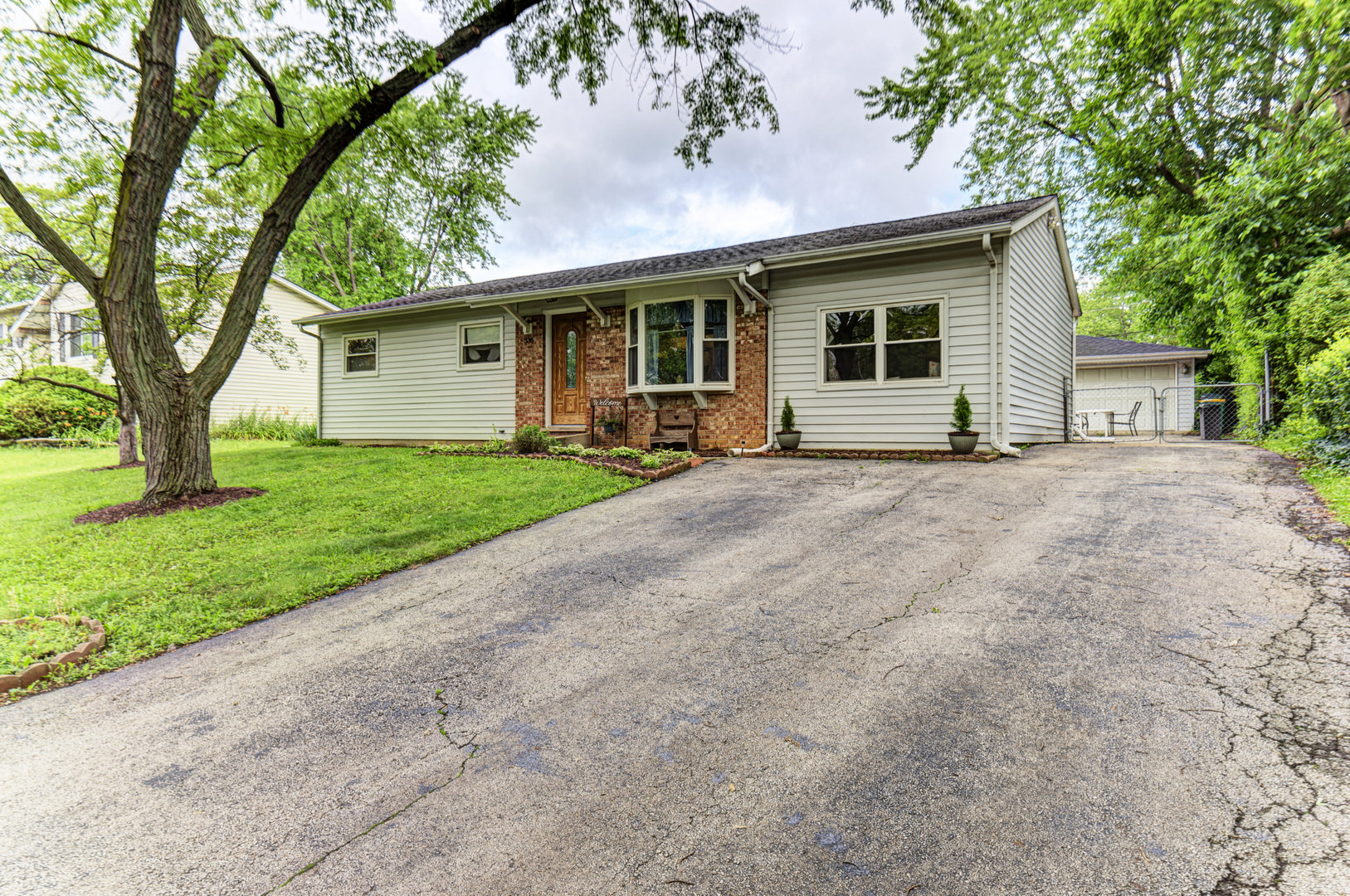 336 Hadleigh Road Bolingbrook, IL 60440 - Photo 3 of 24 a front view of a house with garden