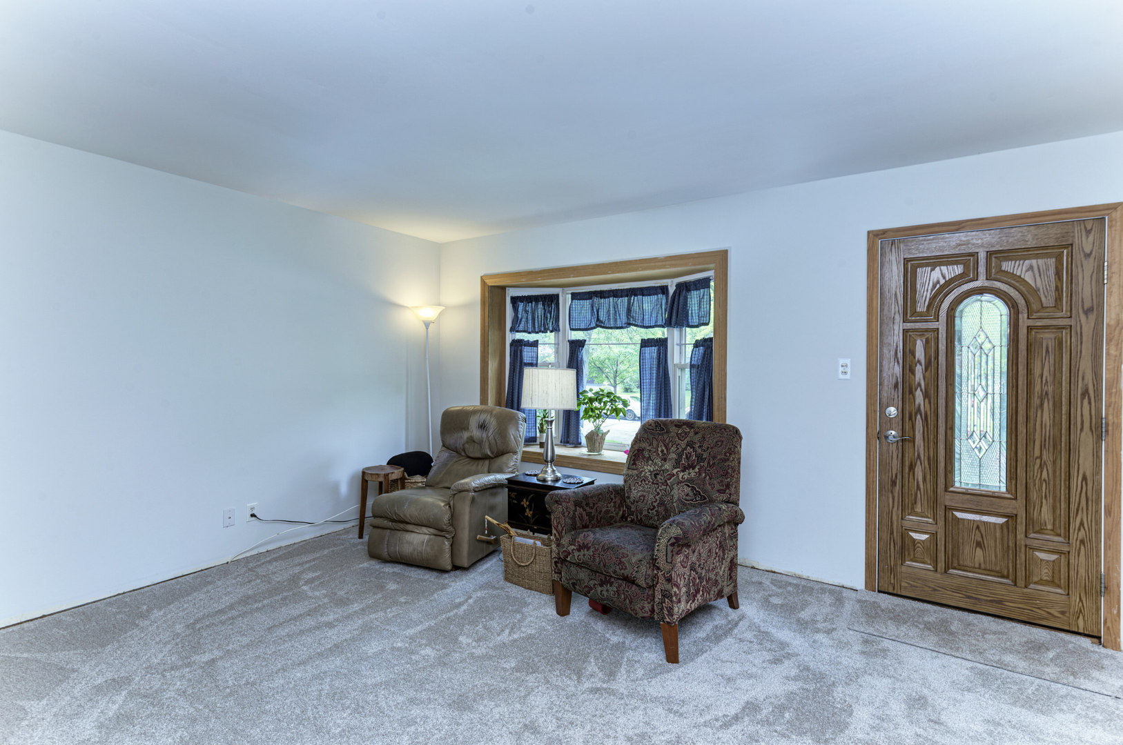 336 Hadleigh Road Bolingbrook, IL 60440 - Photo 5 of 24 a living room with furniture and a window