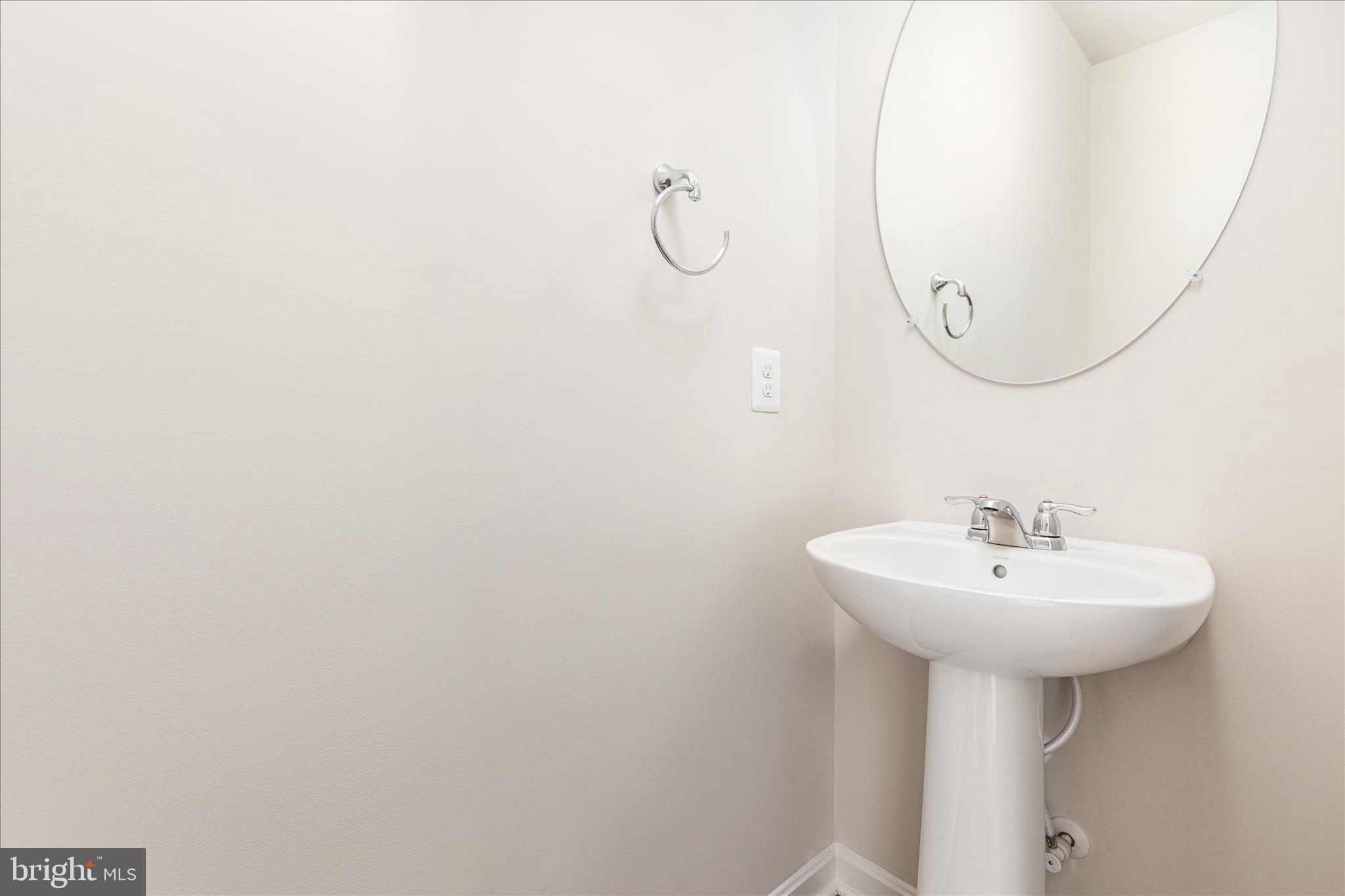 140 Tye Court Winchester, VA 22602 - Photo 16 of 31 a bathroom with a sink a mirror and a shower
