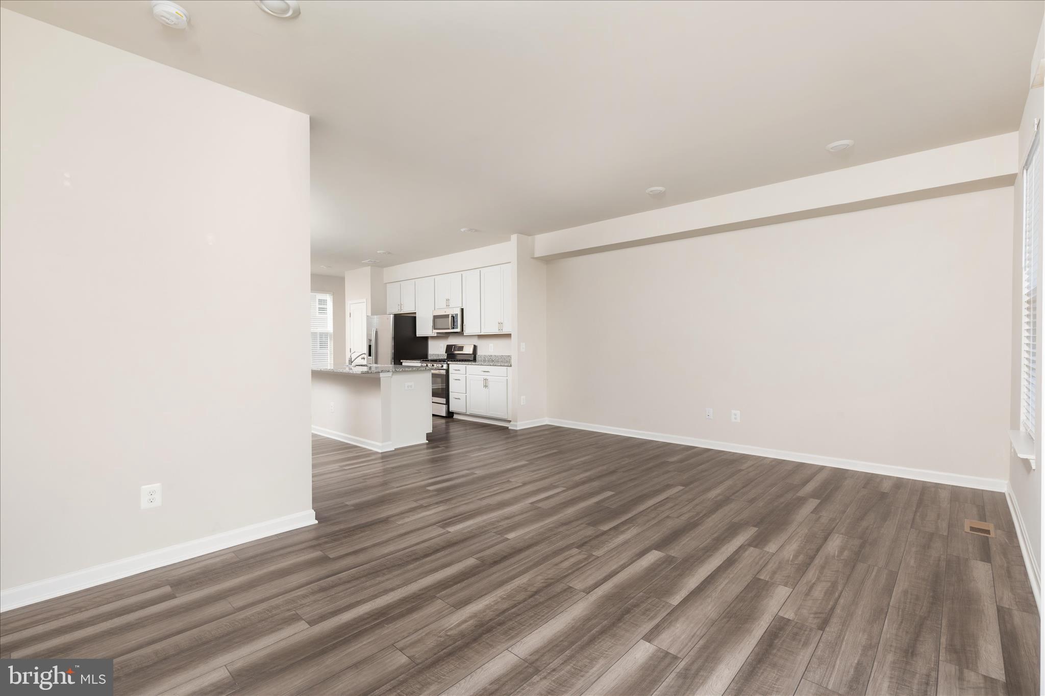 140 Tye Court Winchester, VA 22602 - Photo 21 of 31 a view of empty room with wooden floor
