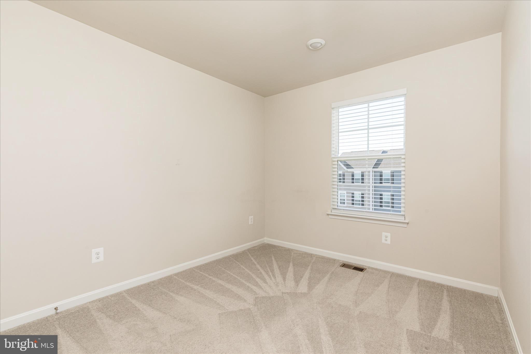 140 Tye Court Winchester, VA 22602 - Photo 8 of 31 an empty room with a window