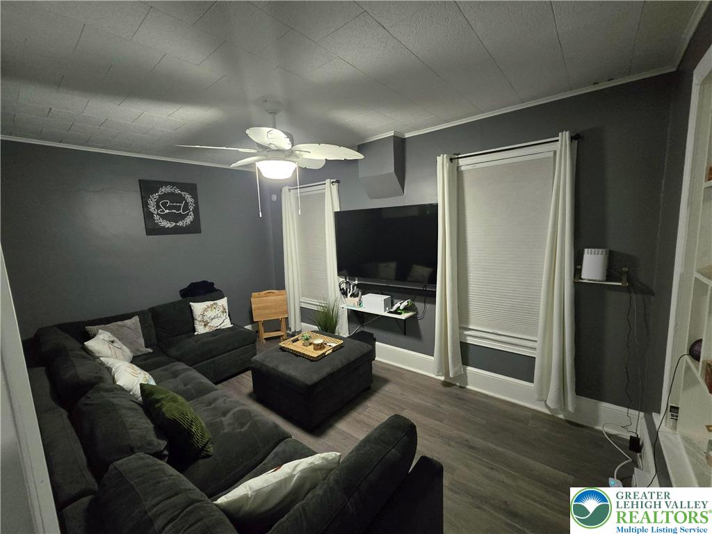 129 Rattlesnake Hill Road Boyertown, PA 19512 - Photo 12 of 26 a living room with furniture and a flat screen tv