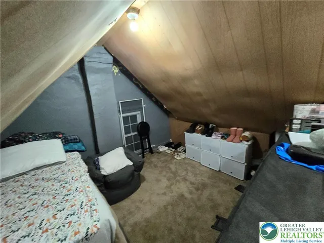 a bedroom with furniture and a couch