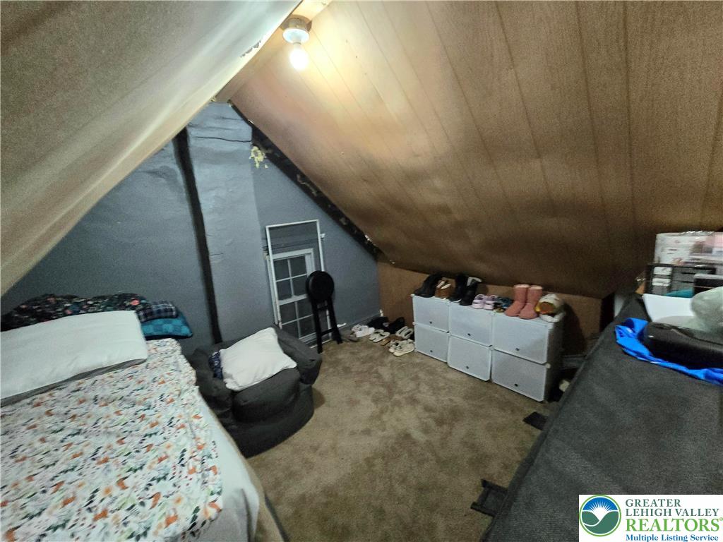 129 Rattlesnake Hill Road Boyertown, PA 19512 - Photo 26 of 26 a bedroom with furniture and a couch