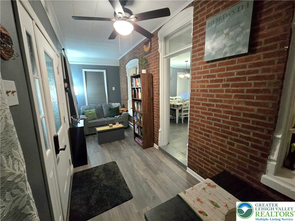 129 Rattlesnake Hill Road Boyertown, PA 19512 - Photo 9 of 26 a view of a hallway and a livingroom with furniture