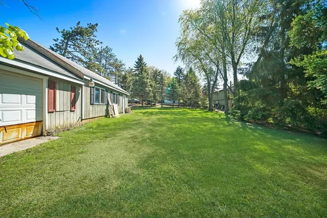 a view of a house with a park