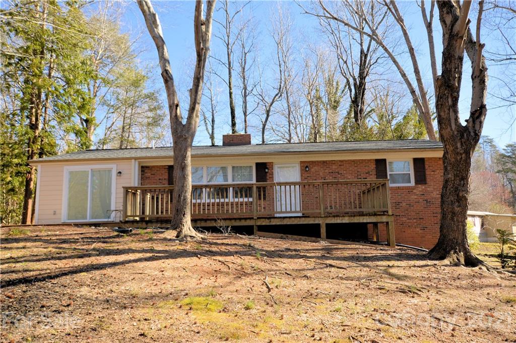 200 Bradshaw Road Tryon, NC 28782 - Photo 2 of 24 a view of a house with a yard covered in snow