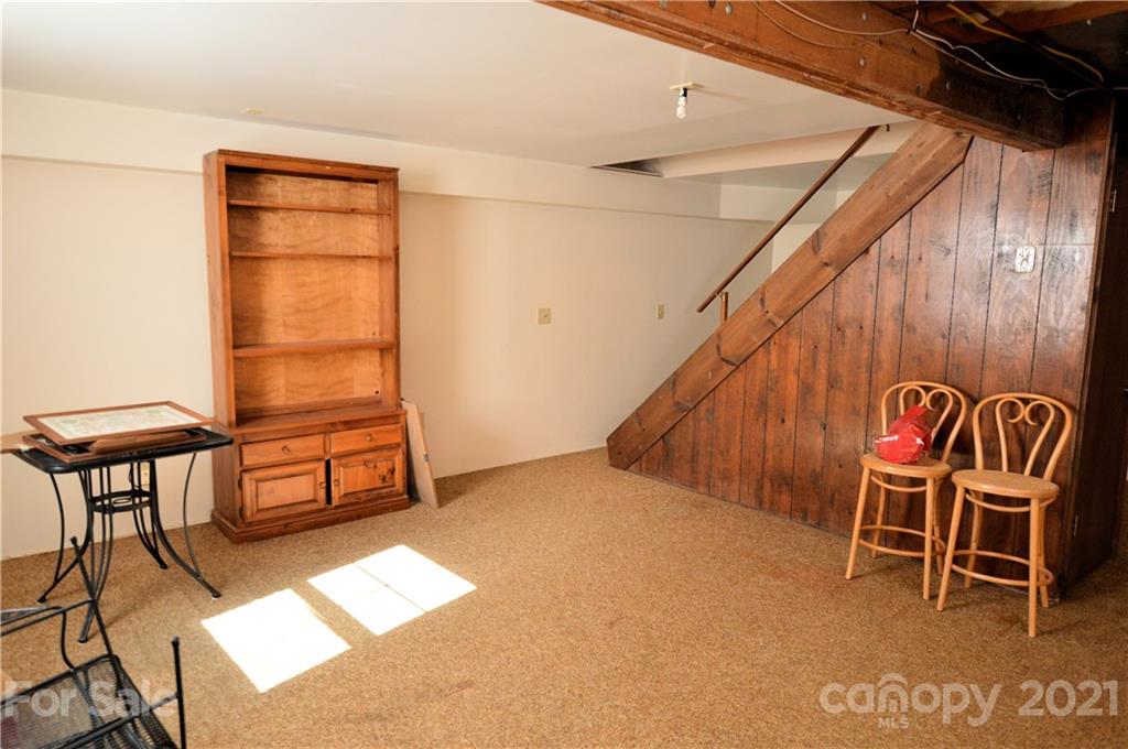 200 Bradshaw Road Tryon, NC 28782 - Photo 14 of 24 a room with a table and chairs