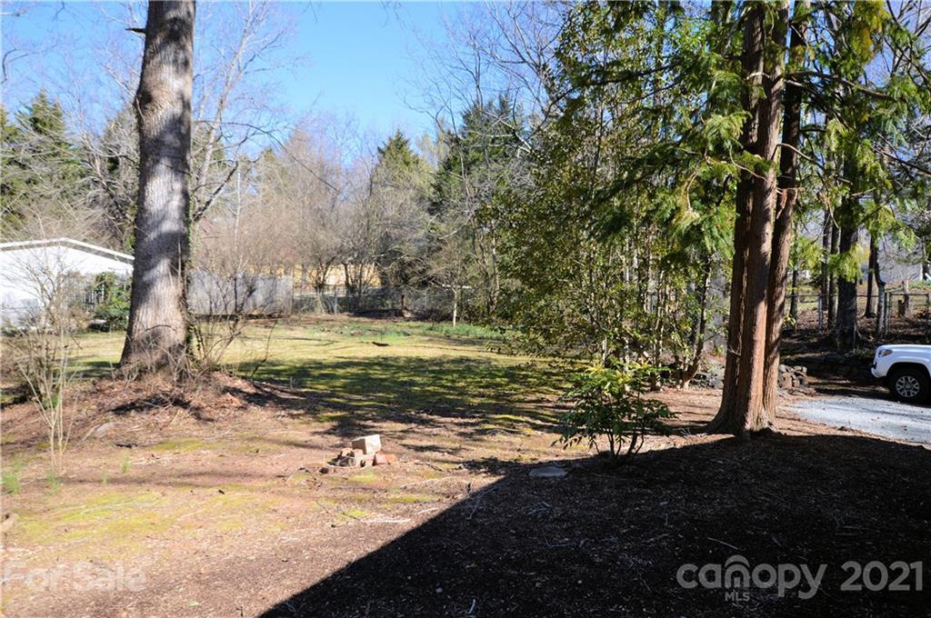 200 Bradshaw Road Tryon, NC 28782 - Photo 20 of 24 a view of a yard with swimming pool