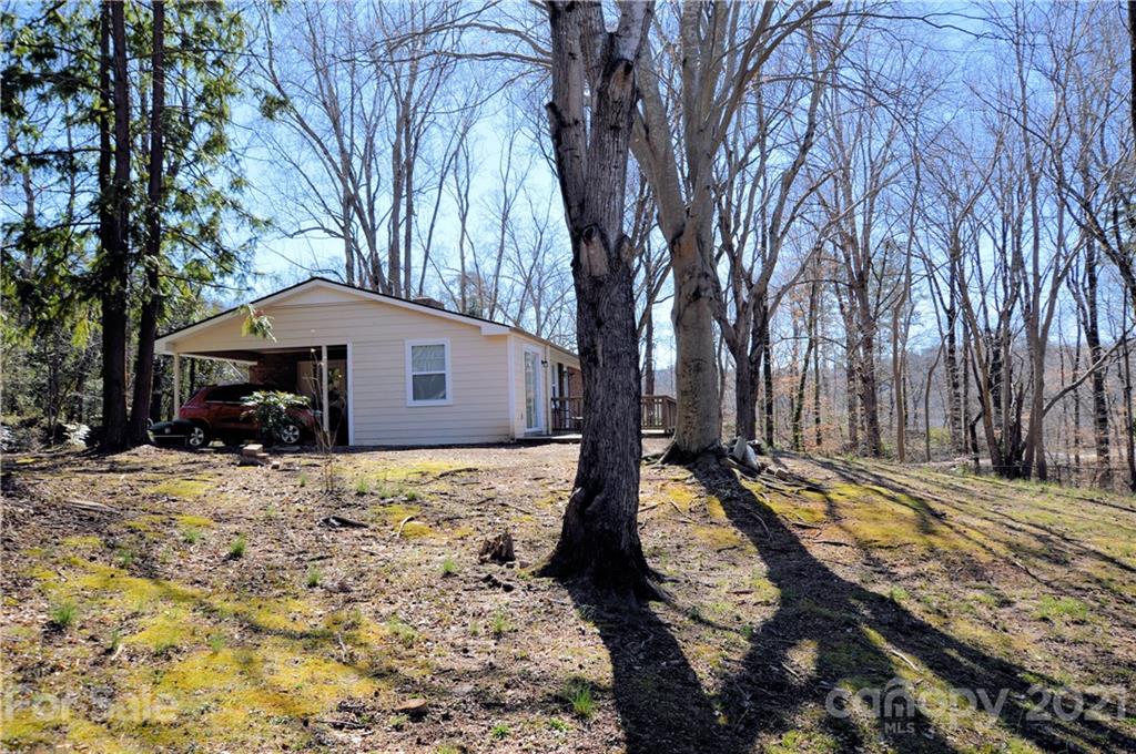 200 Bradshaw Road Tryon, NC 28782 - Photo 22 of 24 a house with trees in the background